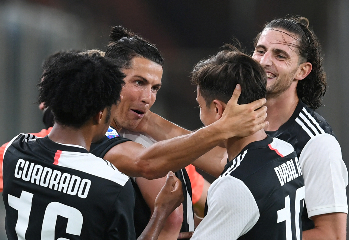 Soccer Football - Serie A - Genoa v Juventus - Stadio Comunale Luigi Ferraris, Genoa, Italy - June 30, 2020  Juventus' Cristiano Ronaldo celebrates scoring their second goal with teammates, as play resumes behind closed doors following the outbreak of the coronavirus disease (COVID-19)   REUTERS
