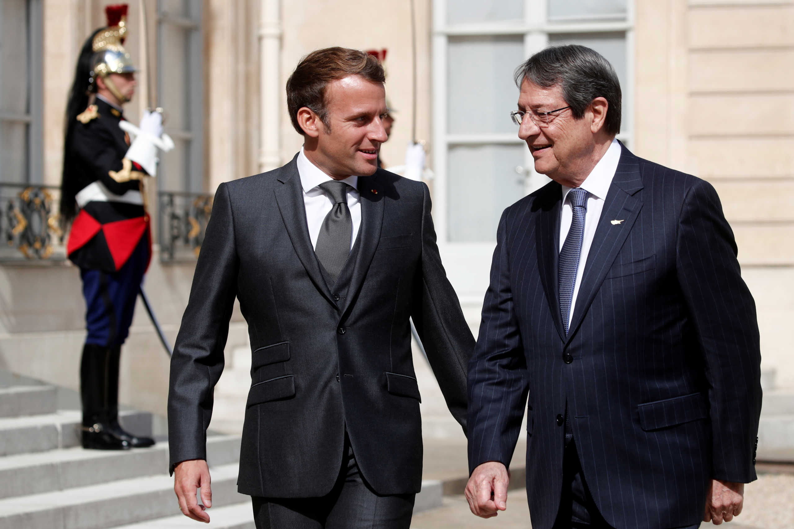 French President Emmanuel Macron welcomes his counterpart of Cyprus Nicos Anastasiades at the Elysee Palace in Paris, France, July 23, 2020. REUTERS