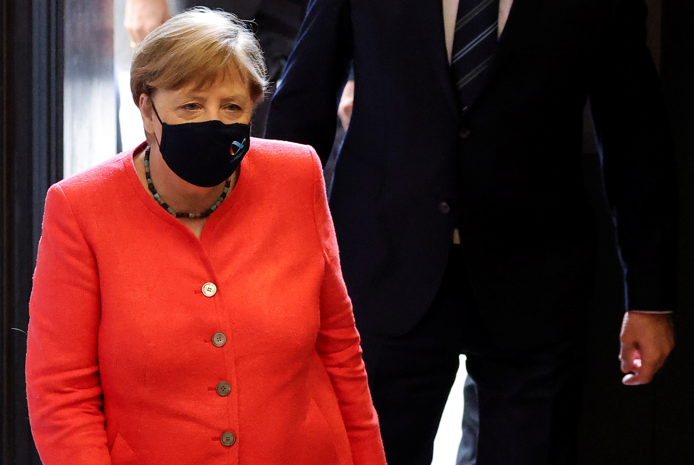 German Chancellor Angela Merkel wearing a face mask arrives to attend a session at the upper house of the German parliament Bundesrat, following the outbreak of the coronavirus disease (COVID-19), in Berlin, Germany, July 3, 2020. REUTERS
