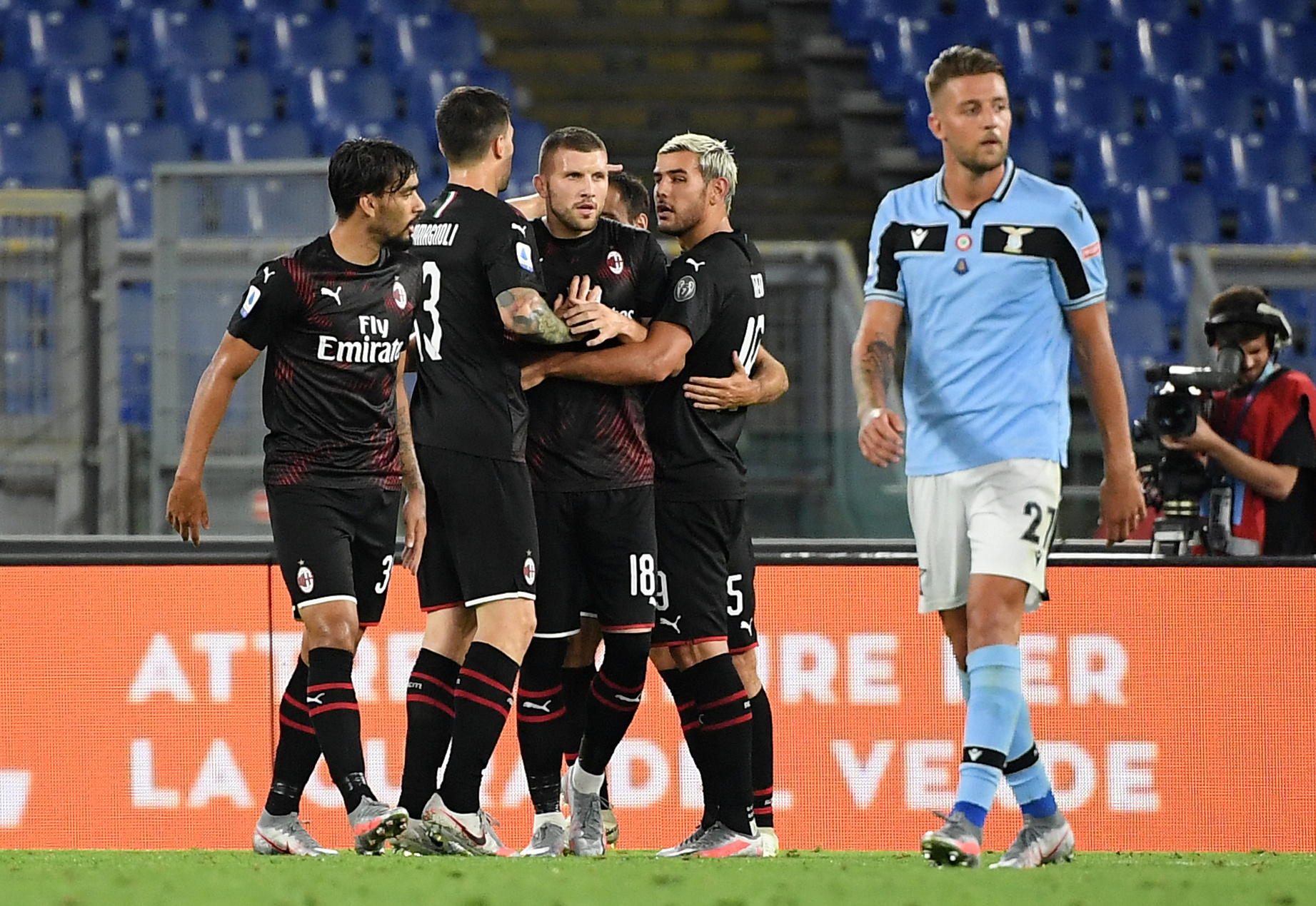 Soccer Football - Serie A - Lazio v AC Milan - Stadio Olimpico, Rome, Italy - July 4, 2020   AC Milan's Ante Rebic celebrates scoring their third goal with teammates, as play resumes behind closed doors following the outbreak of the coronavirus disease (COVID-19)   REUTERS