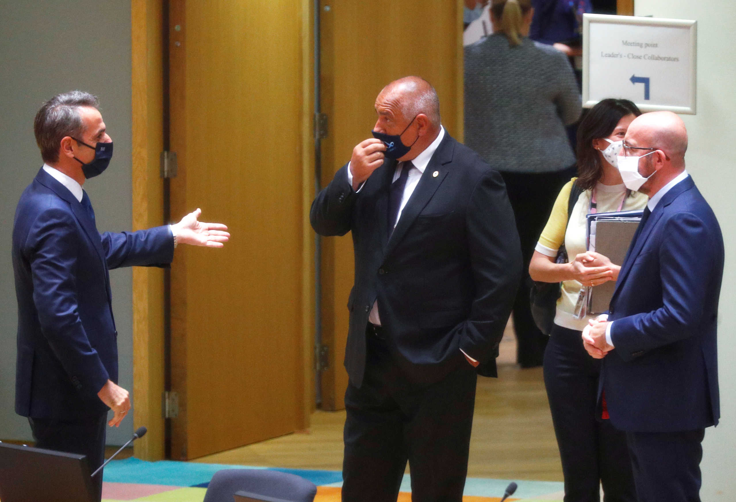 Greek Prime Minister Kyriakos Mitsotakis, Bulgarian Prime Minister Boyko Borissov and European Council President Charles Michel speak as they take part in the first face-to-face EU summit since the coronavirus disease (COVID-19) outbreak, in Brussels, Belgium July 17, 2020. REUTERS
