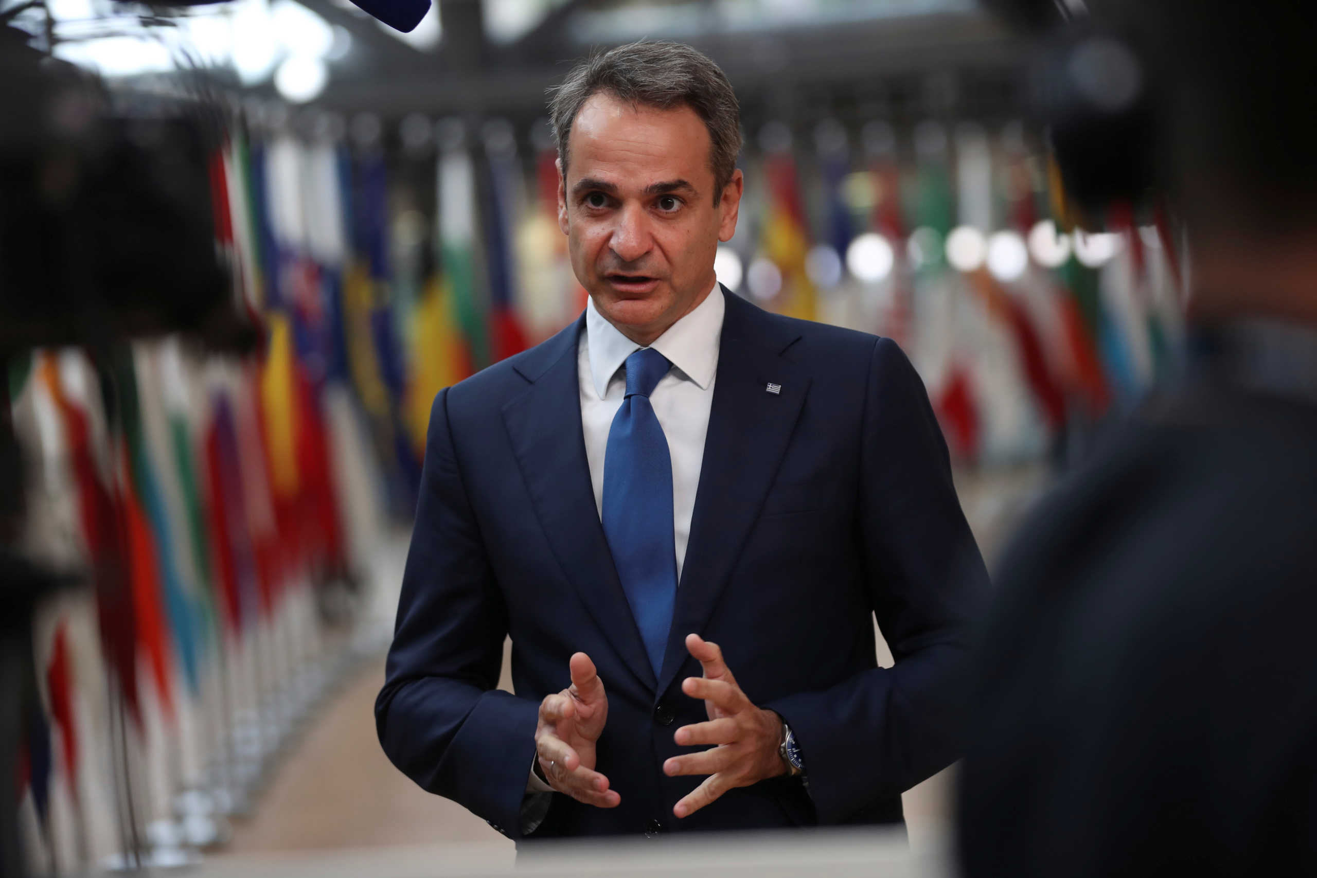 Greek Prime Minister Kyriakos Mitsotakis makes a statement as he arrives for the first face-to-face EU summit since the coronavirus disease (COVID-19) outbreak, in Brussels, Belgium July 17, 2020. Francisco Seco