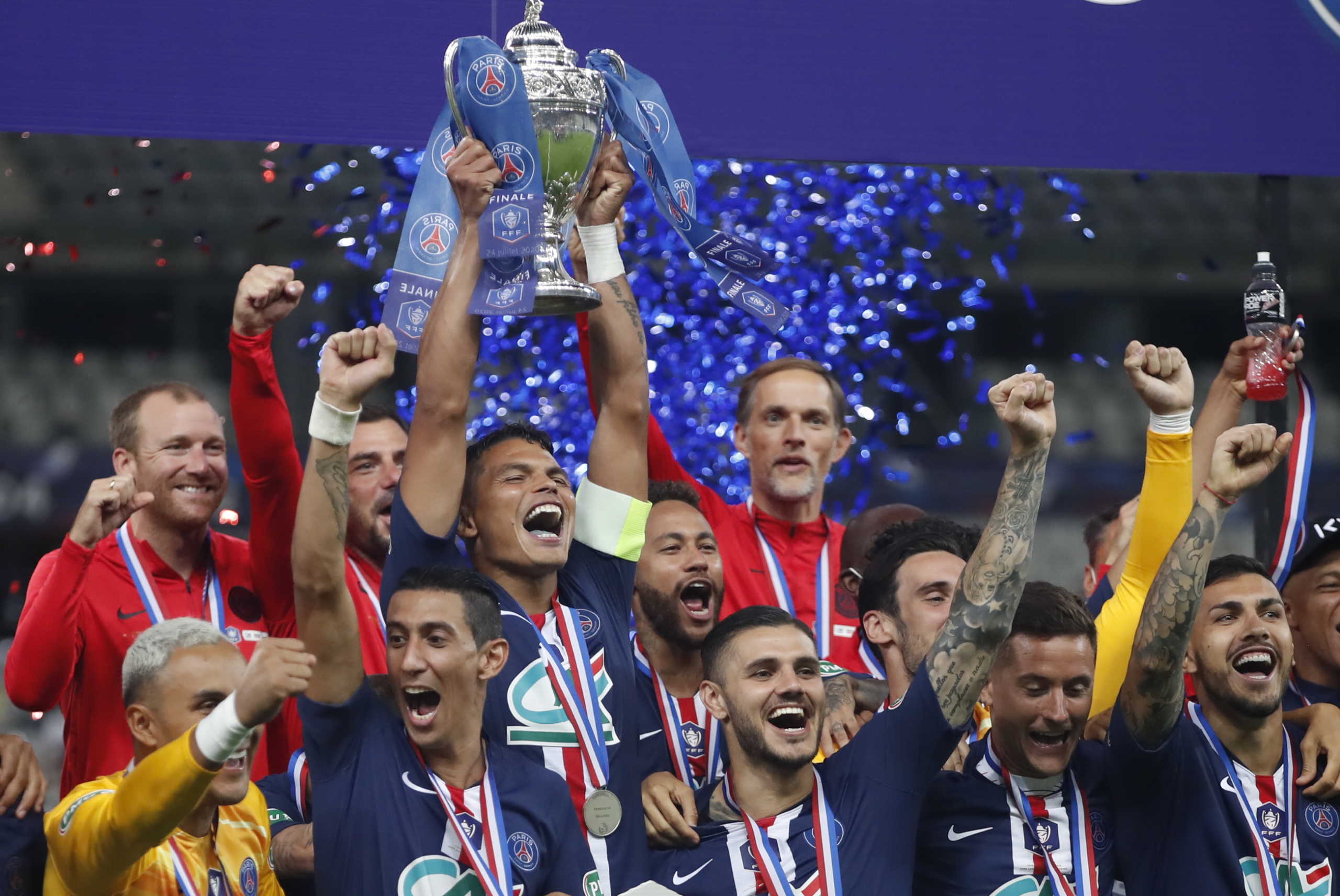 Soccer Football - Coupe de France - Final - Paris St Germain v AS Saint-Etienne - Stade de France, Saint-Denis near Paris, France - July 24, 2020 Paris St Germain's Thiago Silva with teammates celebrate with the trophy after winning the Coupe de France, following the outbreak of the coronavirus disease (COVID-19) REUTERS