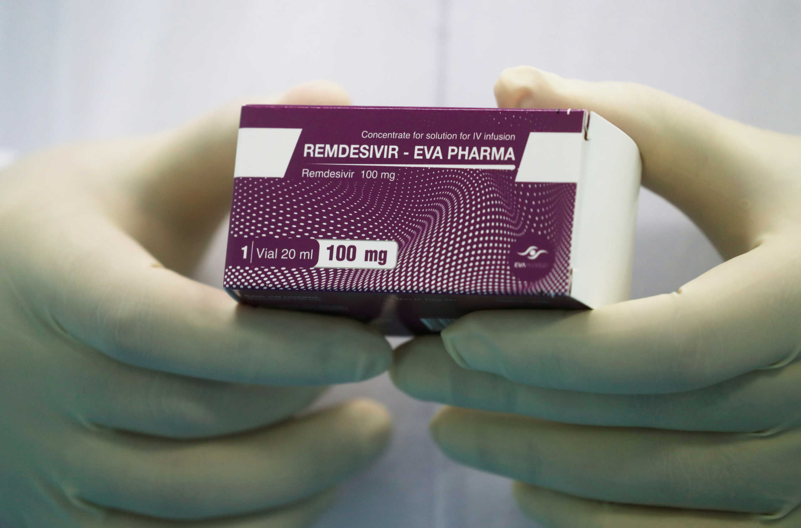 FILE PHOTO: A lab technicians holds the coronavirus disease (COVID-19) treatment drug "Remdesivir" at Eva Pharma Facility in Cairo, Egypt June 25, 2020. REUTERS
