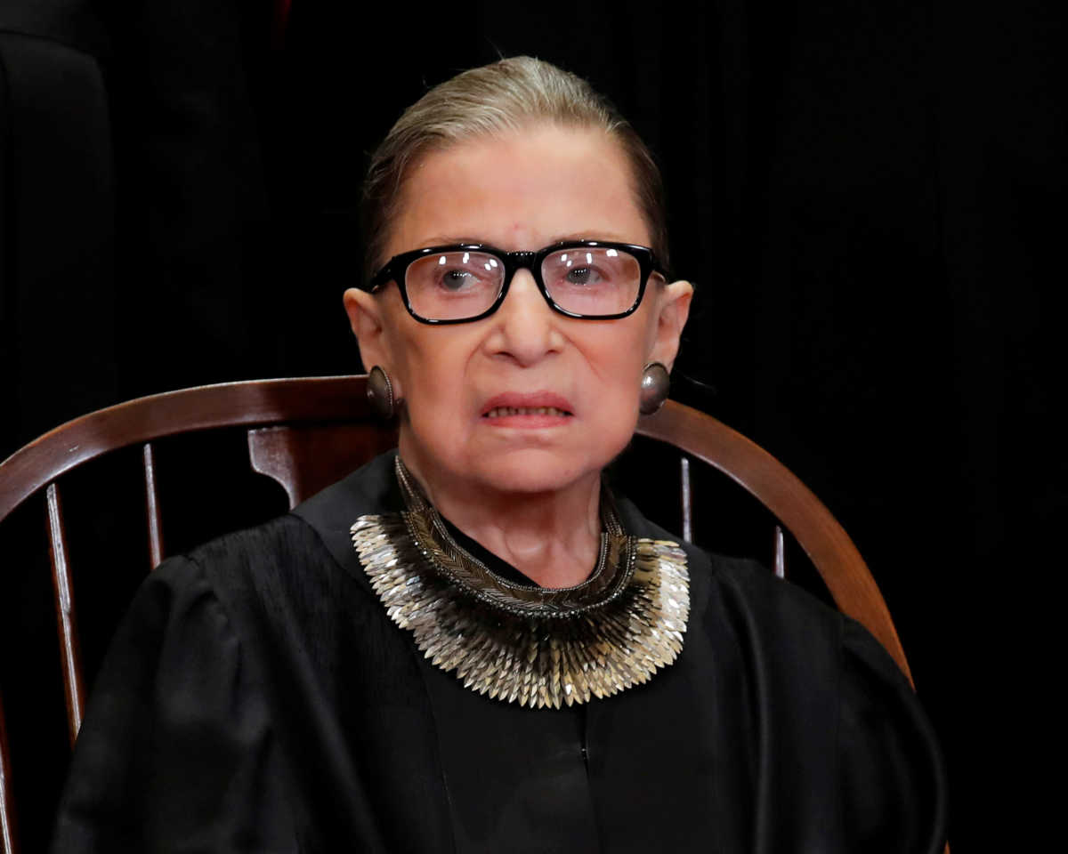 FILE PHOTO: U.S. Supreme Court Associate Justice Ruth Bader Ginsburg is seen during a group portrait session for the new full court at the Supreme Court in Washington, U.S., November 30, 2018. REUTERS
