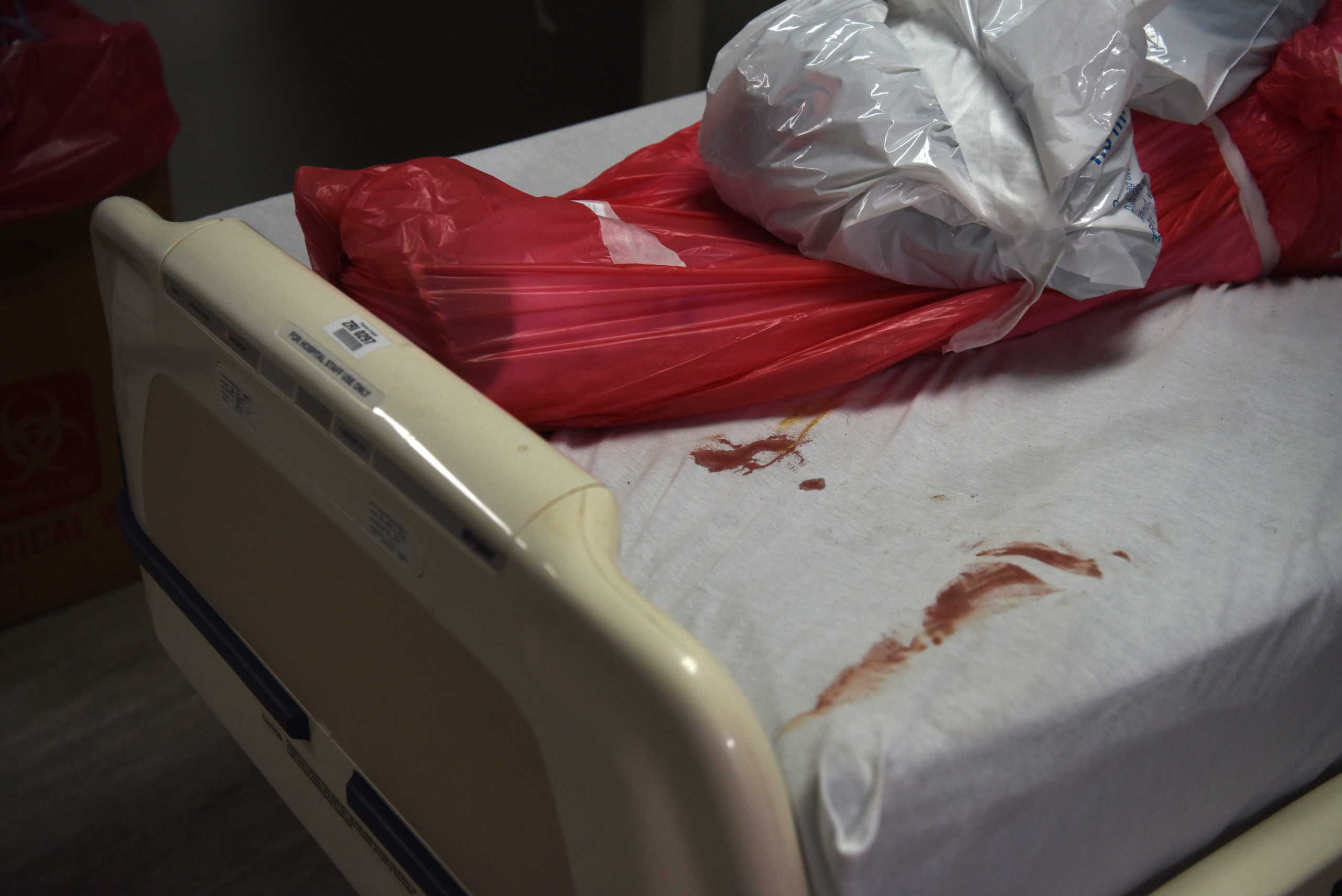 SENSITIVE MATERIAL. THIS IMAGE MAY OFFEND OR DISTURB A man who died from the coronavirus disease (COVID-19) is seen wrapped in a body bag at the United Memorial Medical Center's coronavirus disease (COVID-19) intensive care unit in Houston, Texas, U.S., June 29, 2020.  REUTERS