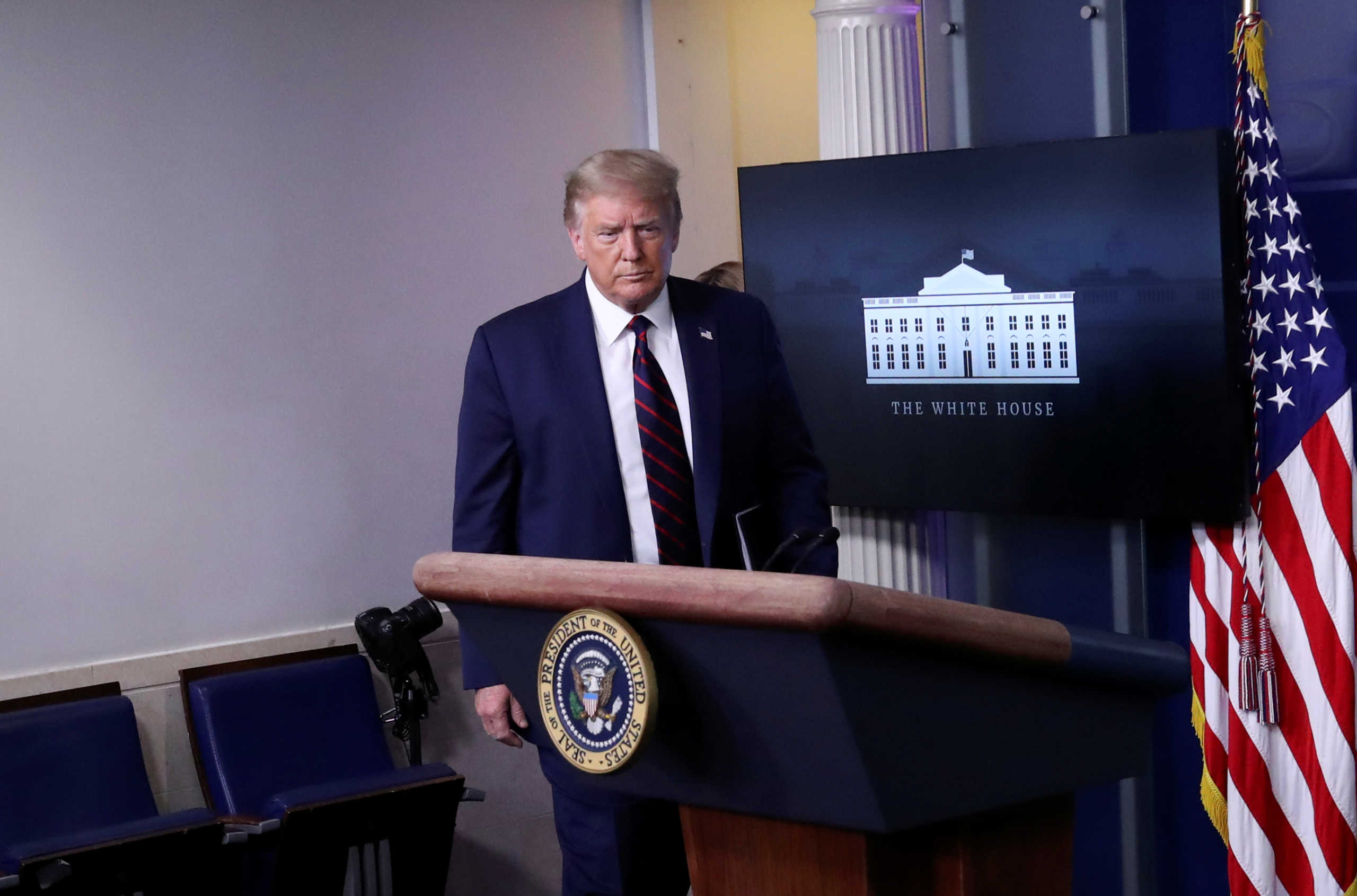 U.S. President Donald Trump arrives to address a coronavirus disease (COVID-19) response news briefing at the White House in Washington, U.S., July 21, 2020. REUTERS
