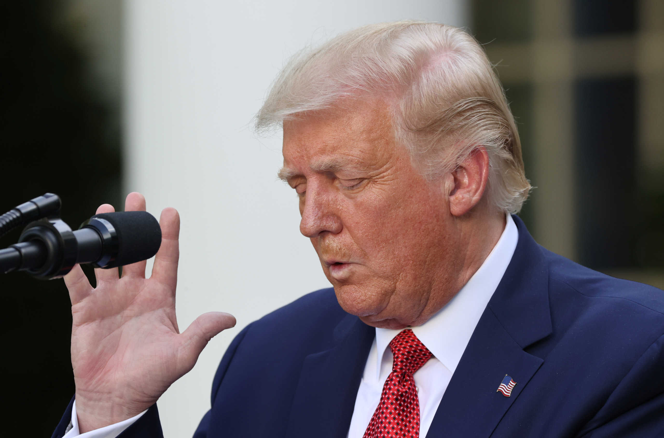 U.S. President Donald Trump attends a news conference in the Rose Garden at the White House in Washington, U.S., July 14, 2020. REUTERS