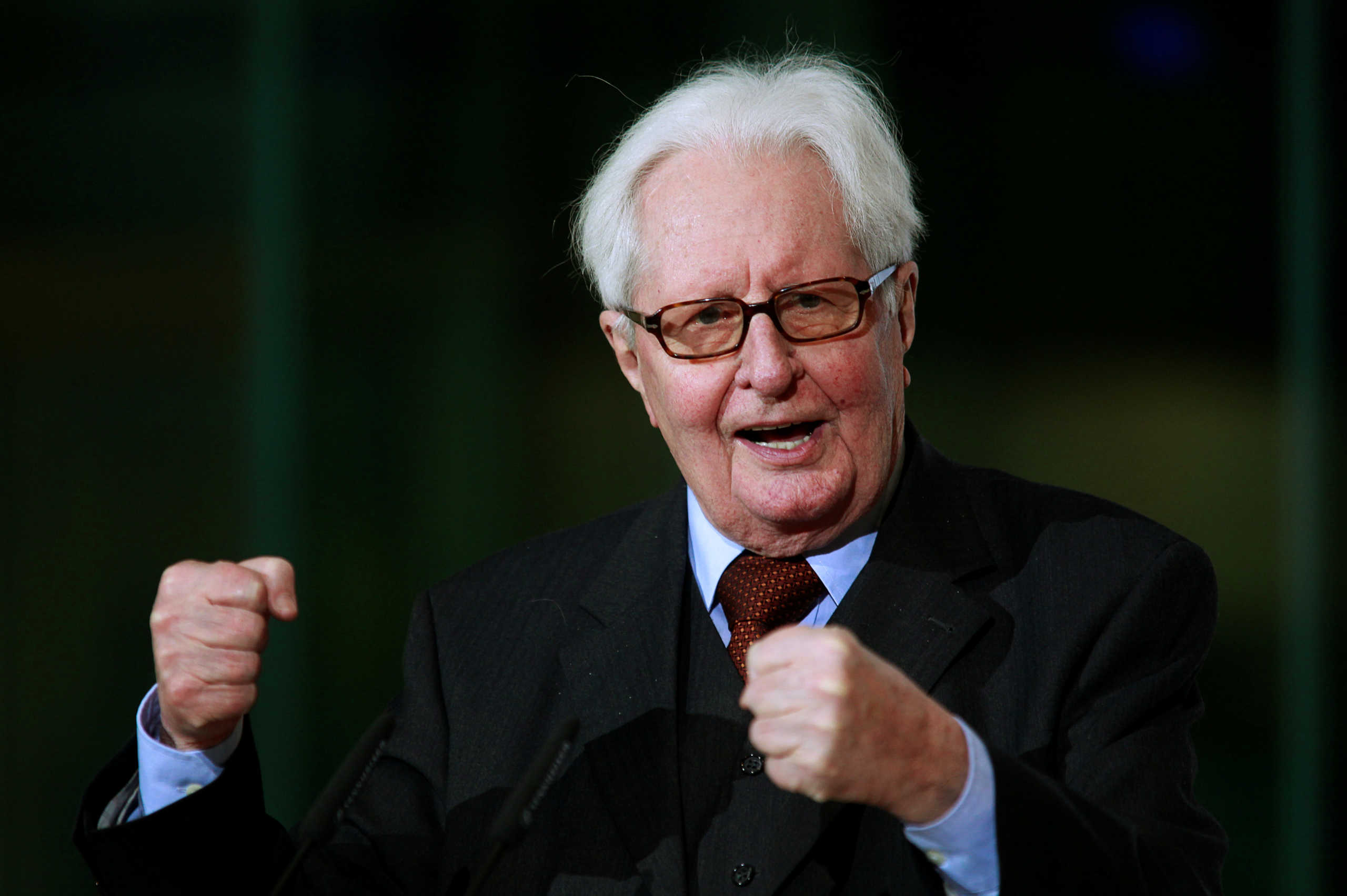 FILE PHOTO: Former leader of the Social Democratic Party (SPD) Hans-Jochen Vogel speaks during a ceremony marking his 85th birthday at the SPD headquarters in Berlin, February 7, 2011. Vogel turned 85 on February 3.   REUTERS