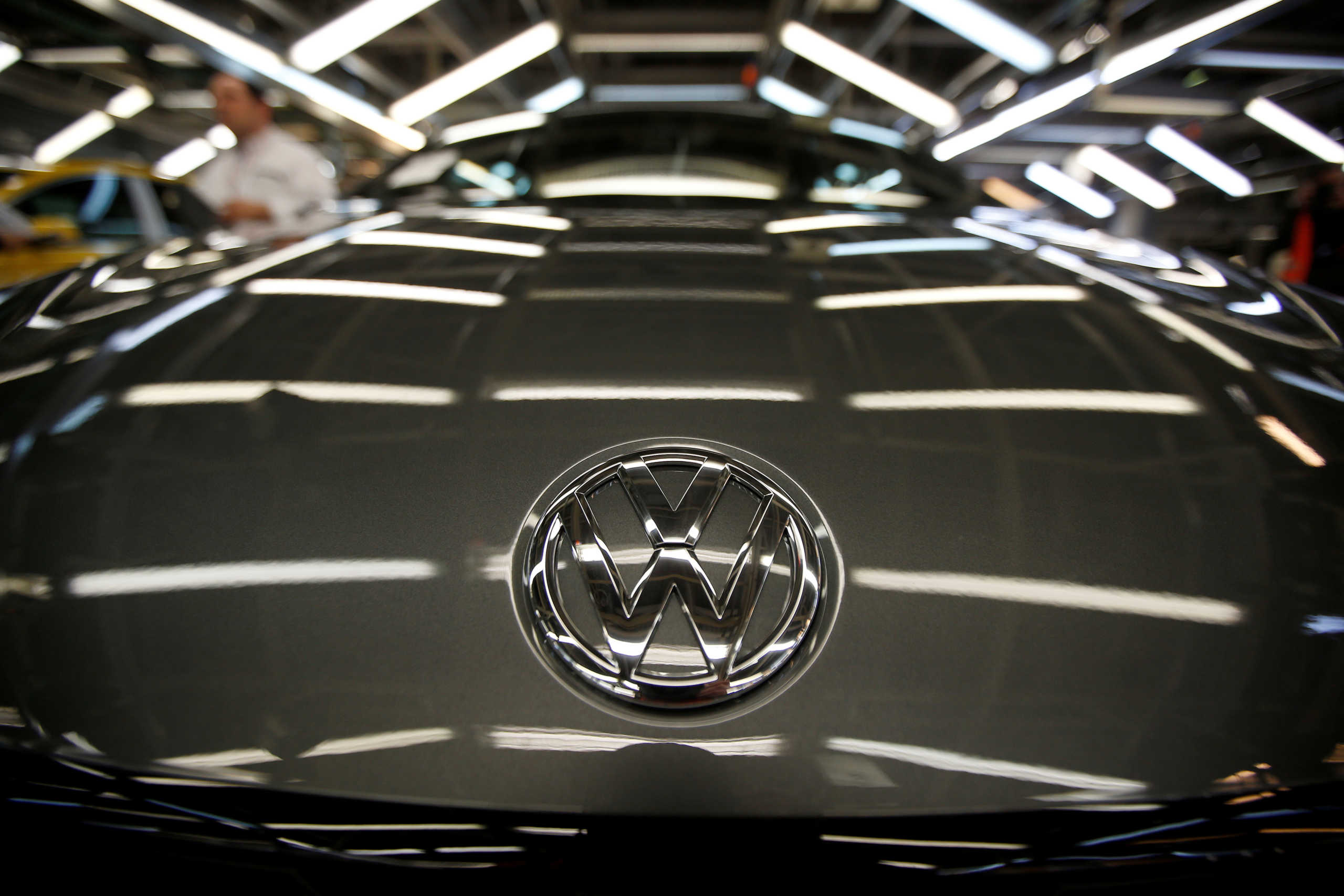 FILE PHOTO: The logo of Volkswagen company is seen on a car on an assembly line at the Volkswagen car factory in Palmela, Portugal, December 9, 2016.   REUTERS