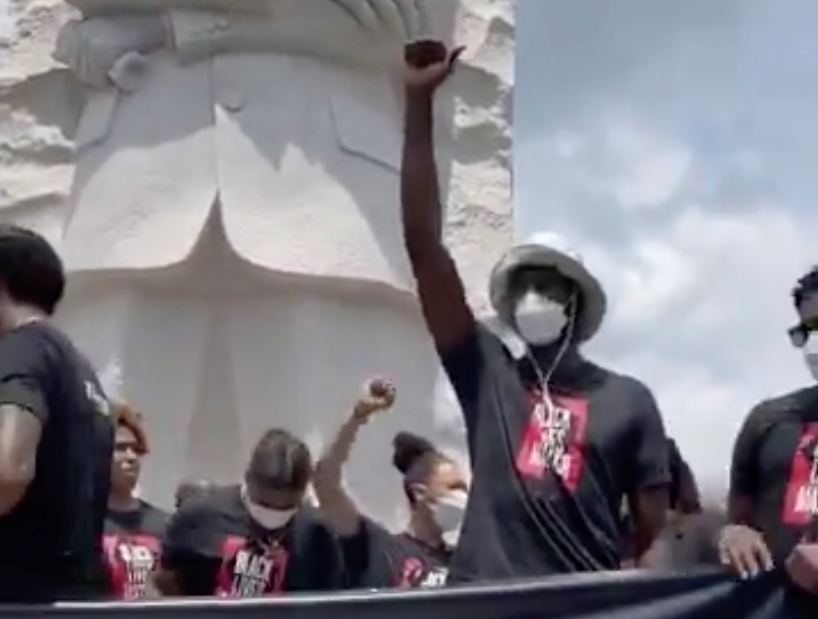 Players from the Washington Wizards and Washington Mystics basketball teams take part in a demonstration to mark Juneteenth, which commemorates the end of slavery in Texas, two years after the 1863 Emancipation Proclamation freed slaves elsewhere in the United States, amid nationwide protests against racial inequality, in Washington, D.C., U.S., June 19, 2020 in this still image taken from social media video. Washington Wizards via REUTERS   THIS IMAGE HAS BEEN SUPPLIED BY A THIRD PARTY. MANDATORY CREDIT. NO RESALES. NO ARCHIVES