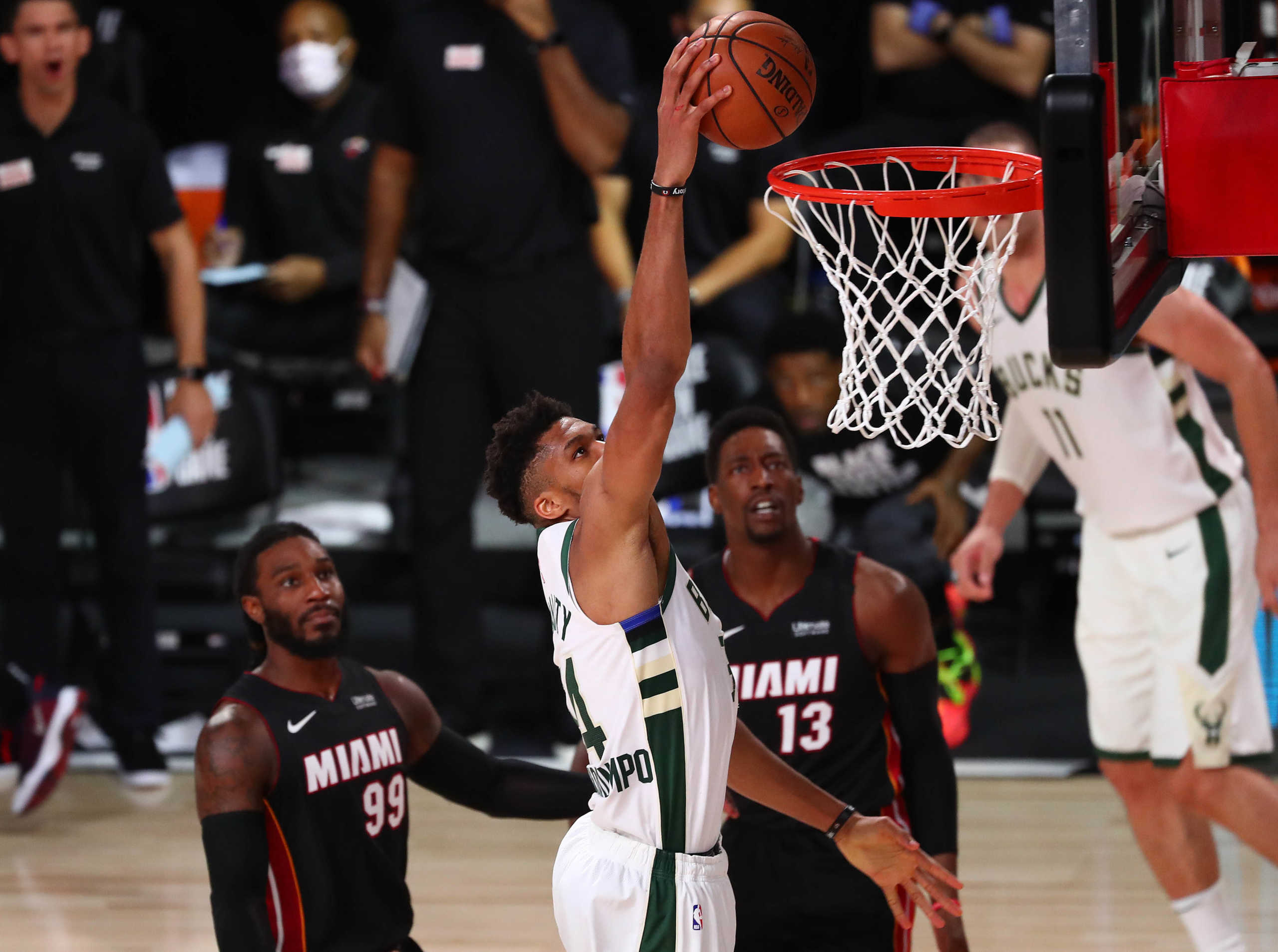 August 6, 2020; Lake Buena Vista, Florida, USA; Milwaukee Bucks forward Giannis Antetokounmpo (34) moves in for a basket against the Miami Heat during the second half of an NBA basketball game at The Arena. Mandatory Credit: Kim Klement-USA TODAY Sports