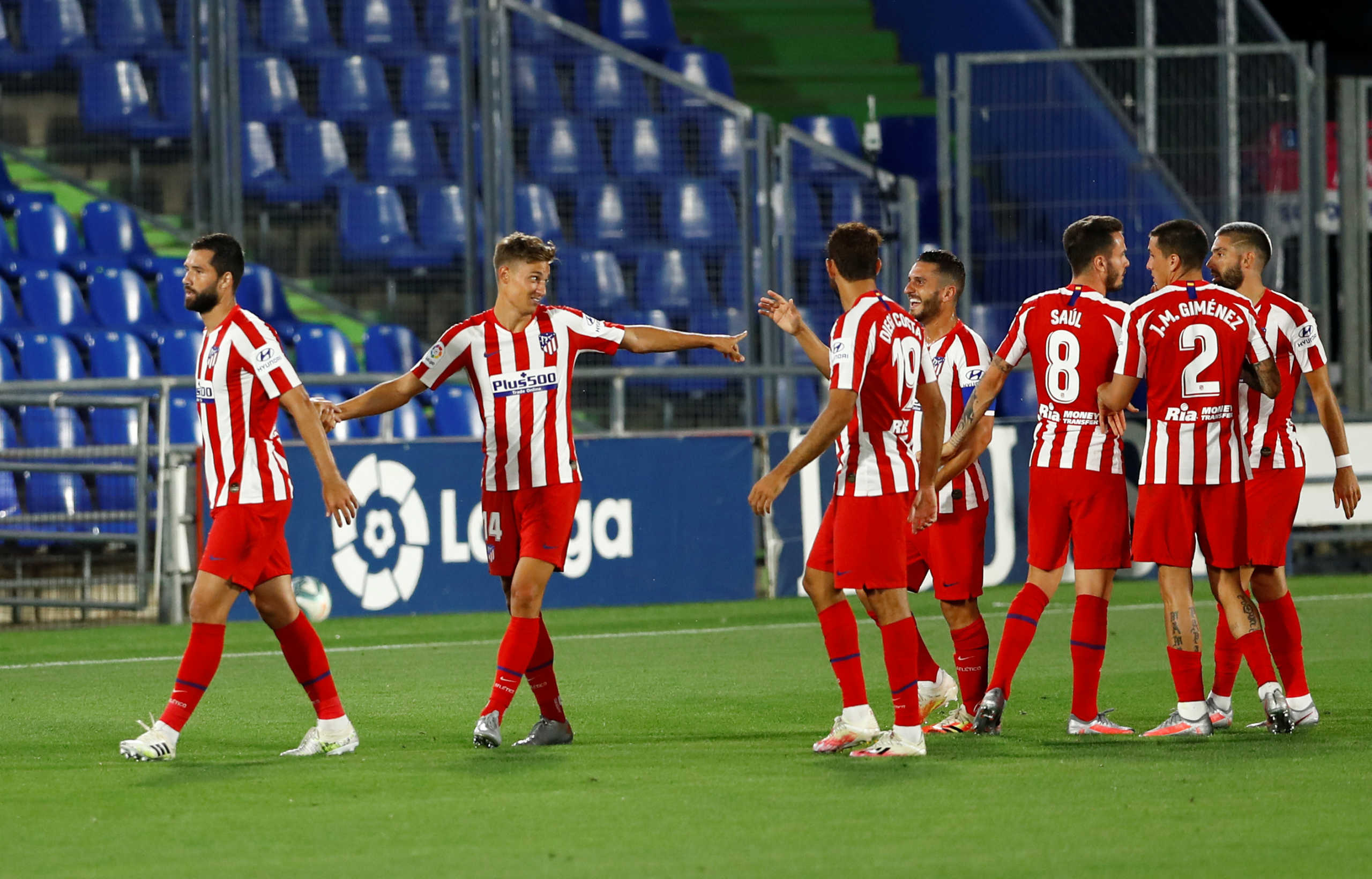 Soccer Football - La Liga Santander - Getafe v Atletico Madrid - Coliseum Alfonso Perez, Getafe, Spain - July 16, 2020   Atletico Madrid's Marcos Llorente celebrates scoring their first goal with teammates, as play resumes behind closed doors following the outbreak of the coronavirus disease (COVID-19)   REUTERS
