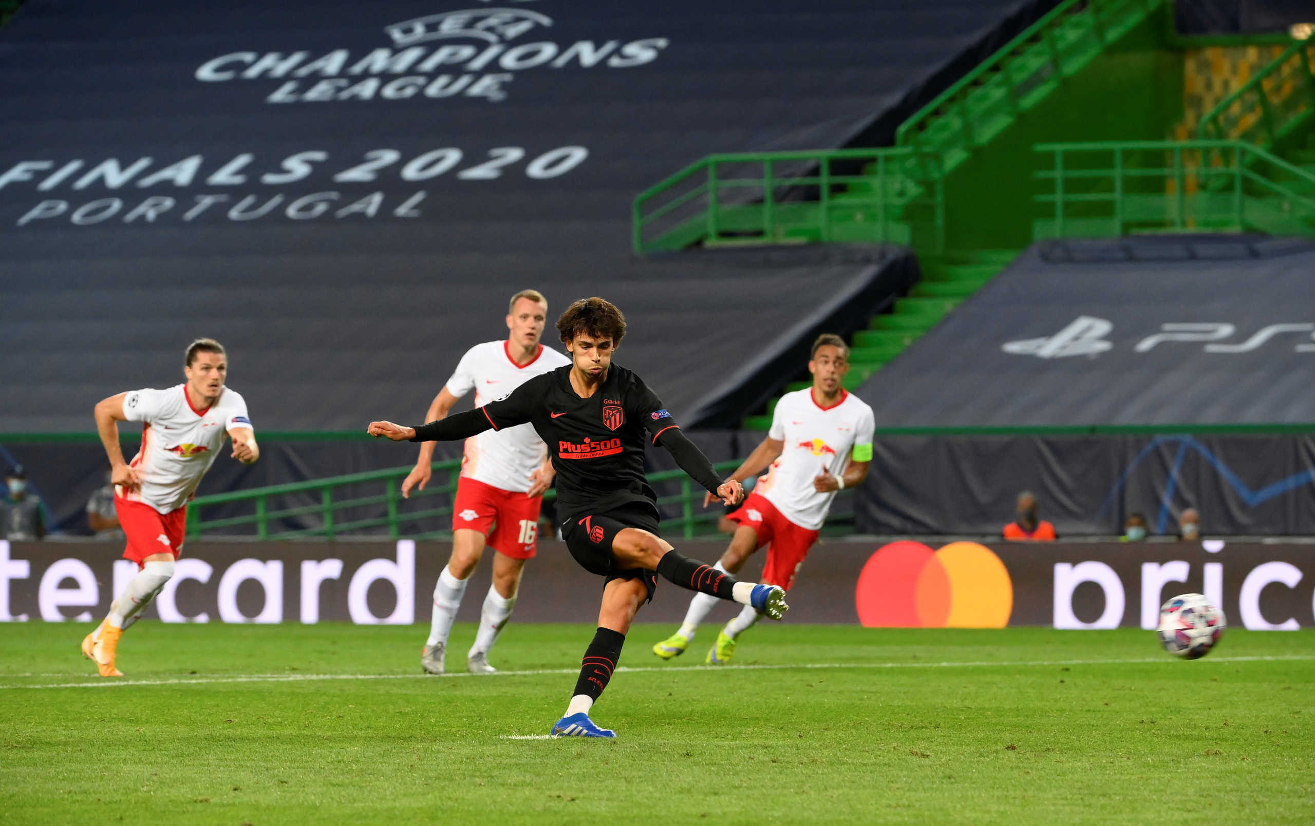 Soccer Football - Champions League - Quarter Final - RB Leipzig v Atletico Madrid - Estadio Jose Alvalade, Lisbon, Portugal - August 13, 2020  Atletico Madrid's Joao Felix scores their first goal from the penalty spot, as play resumes behind closed doors following the outbreak of the coronavirus disease (COVID-19)  Lluis Gene