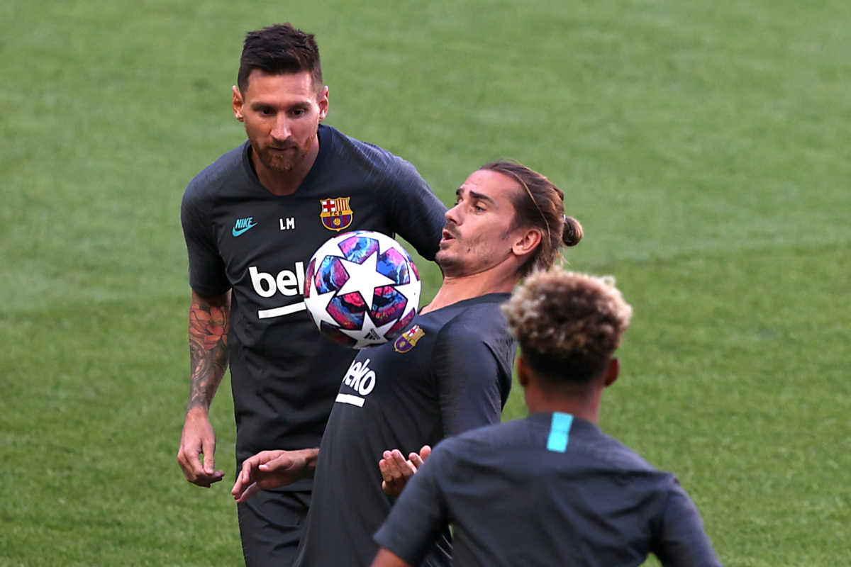 Soccer Football - Champions League - FC Barcelona Training - Estadio da Luz, Lisbon, Portugal - August 13, 2020  FC Barcelona's Antoine Griezmann and Lionel Messi during training  REUTERS