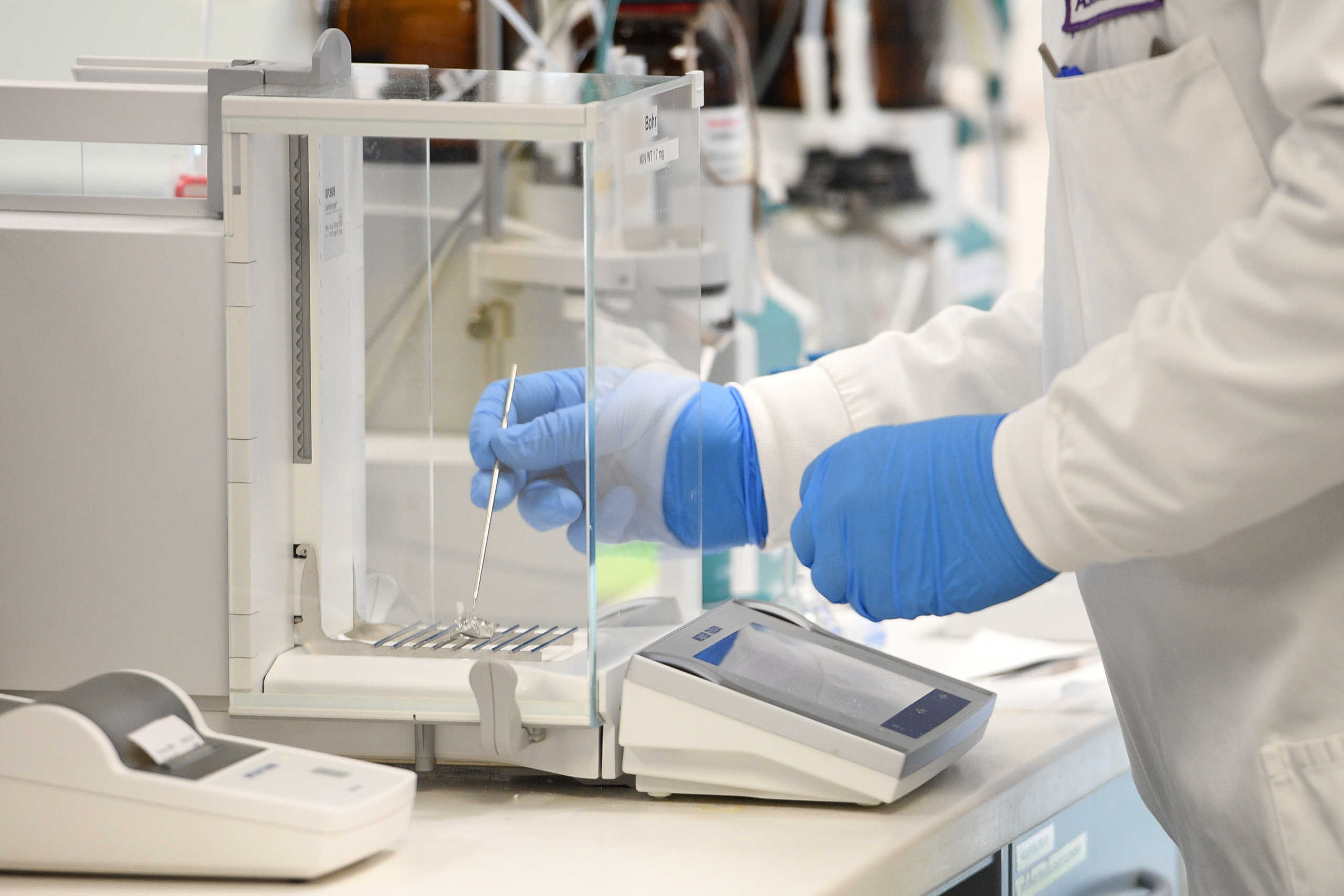 A chemist works at AstraZeneca's headquarters, after Prime Minister Scott Morrison announced Australians will be among the first in the world to receive a coronavirus disease (COVID-19) vaccine, if it proves successful, through an agreement between the government and UK-based drug company AstraZeneca, in Sydney, Australia, August 19, 2020.  AAP Image
