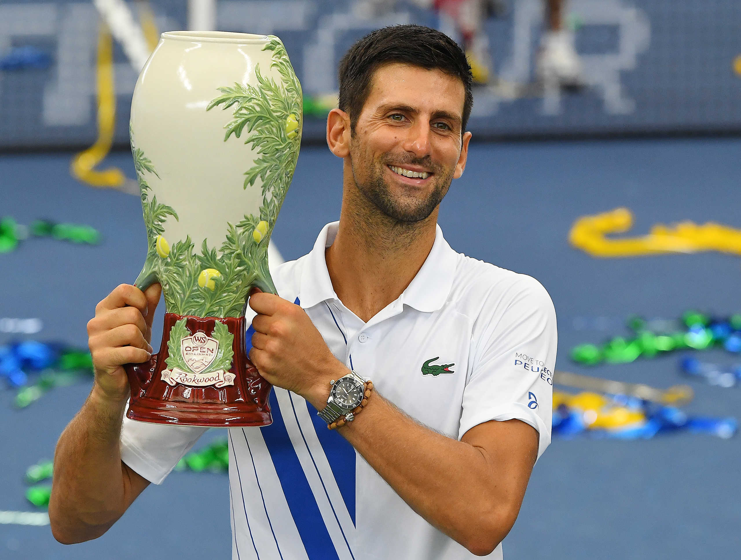 Aug 29, 2020; Flushing Meadows, New York, USA; Mens champion Novak Djokovic (SRB) poses with the trophy following his win over Milos Raonic (CAN) in the Western & Southern Open at the USTA Billie Jean King National Tennis Center. Mandatory Credit: Robert Deutsch-USA TODAY Sports