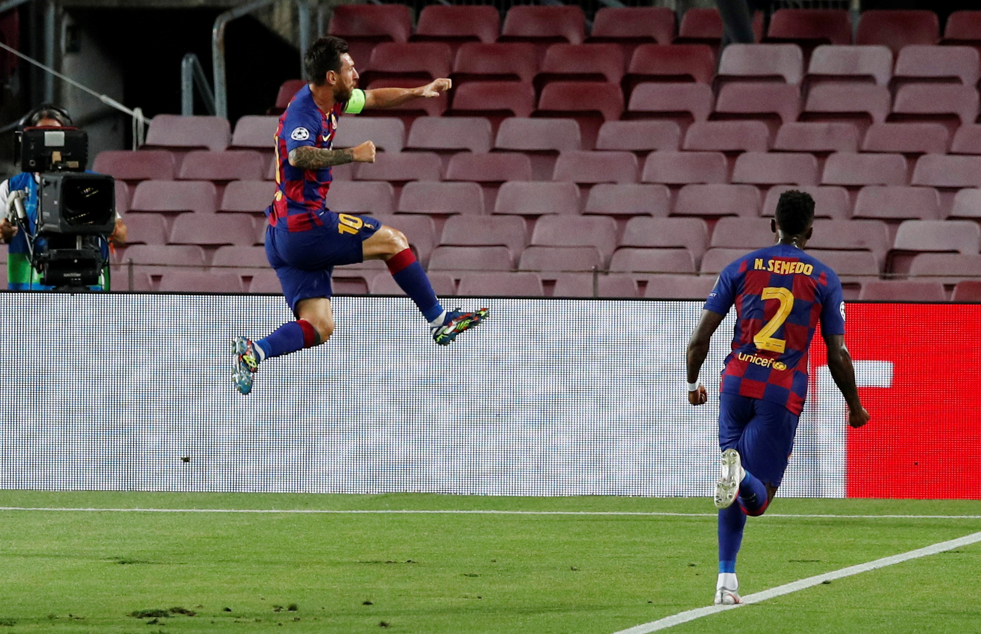 Soccer Football - Champions League - Round of 16 Second Leg - FC Barcelona v Napoli - Camp Nou, Barcelona, Spain - August 8, 2020  Barcelona's Lionel Messi celebrates scoring their second goal, as play resumes behind closed doors following the outbreak of the coronavirus disease (COVID-19)  REUTERS