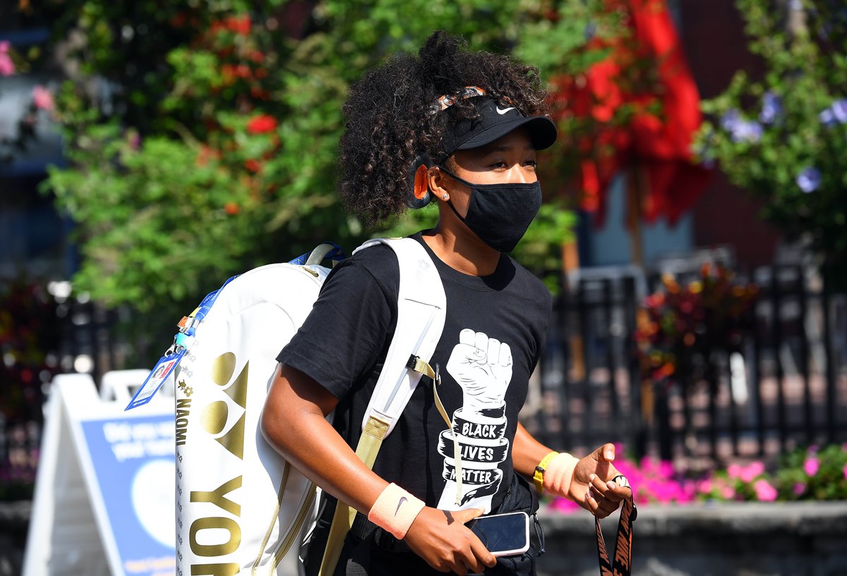 Aug 28, 2020; Flushing Meadows, New York, USA; Naomi Osaka (JPN) prepares to enter the stadium for her match against Elise Mertens (BEL) during the Western & Southern Open at the USTA Billie Jean King National Tennis Center. Mandatory Credit: Robert Deutsch-USA TODAY Sports