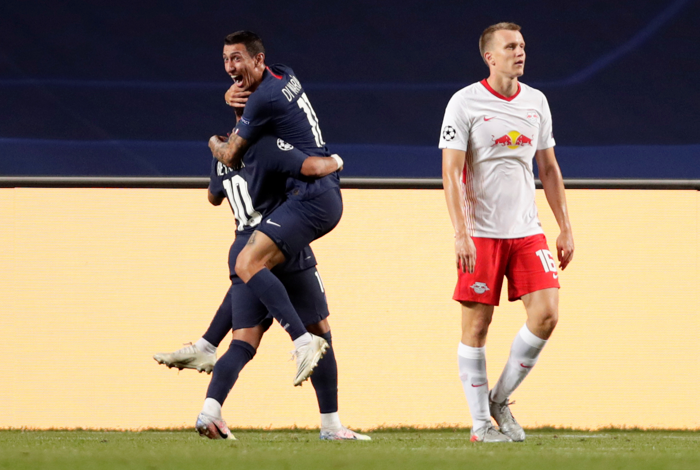 Soccer Football - Champions League - Semi Final - RB Leipzig v Paris St Germain - Estadio da Luz, Lisbon, Portugal - August 18, 2020   Paris St Germain's Angel Di Maria celebrates scoring their second goal with Neymar, as play resumes behind closed doors following the outbreak of the coronavirus disease (COVID-19)   Manu Fernandez