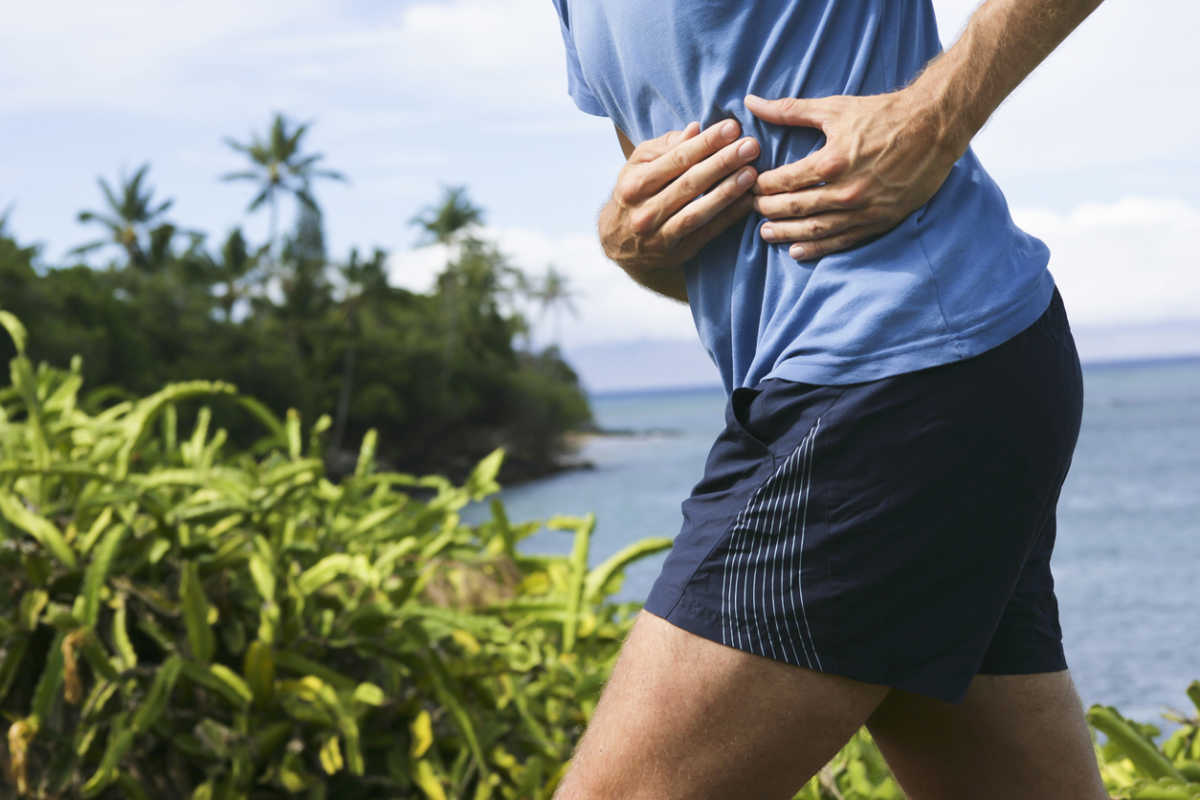 Side stitch- pain in the side of a jogger`s torso. The pain is probably due to a cramp of the diaphragm-muscle. XXL size image.