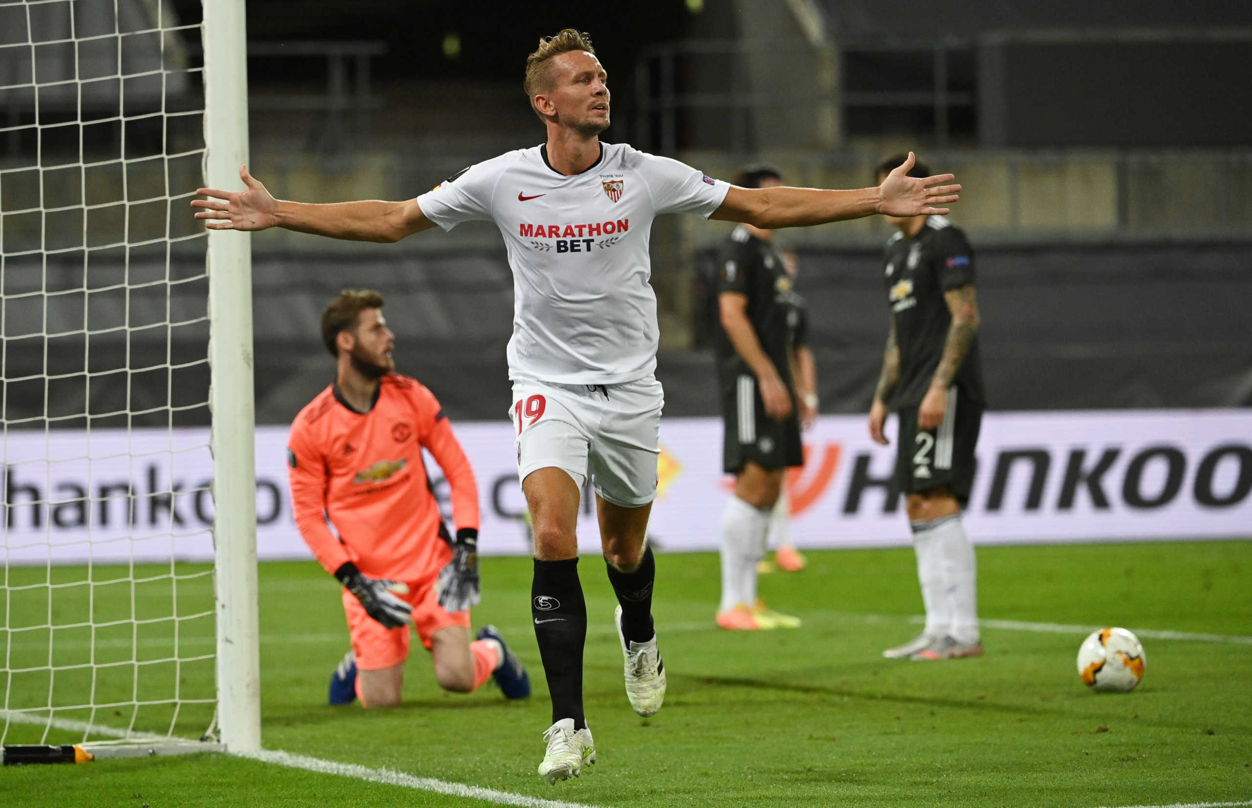 Soccer Football - Europa League Semi Final - Sevilla v Manchester United - RheinEnergieSTADION, Cologne, Germany - August 16, 2020  Sevilla's Luuk de Jong celebrates scoring their second goal, as play resumes behind closed doors following the outbreak of the coronavirus disease (COVID-19) Ina Fassbender