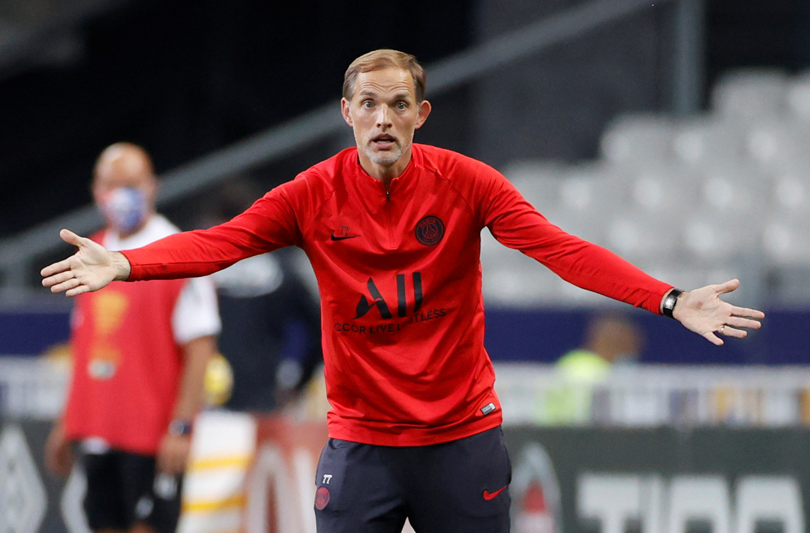 Soccer Football - Coupe de la Ligue - Final - Paris St Germain v Olympique Lyonnais - Stade de France, Saint-Denis near Paris, France - July 31, 2020 Paris St Germain coach Thomas Tuchel reacts, following the outbreak of the coronavirus disease (COVID-19)  REUTERS