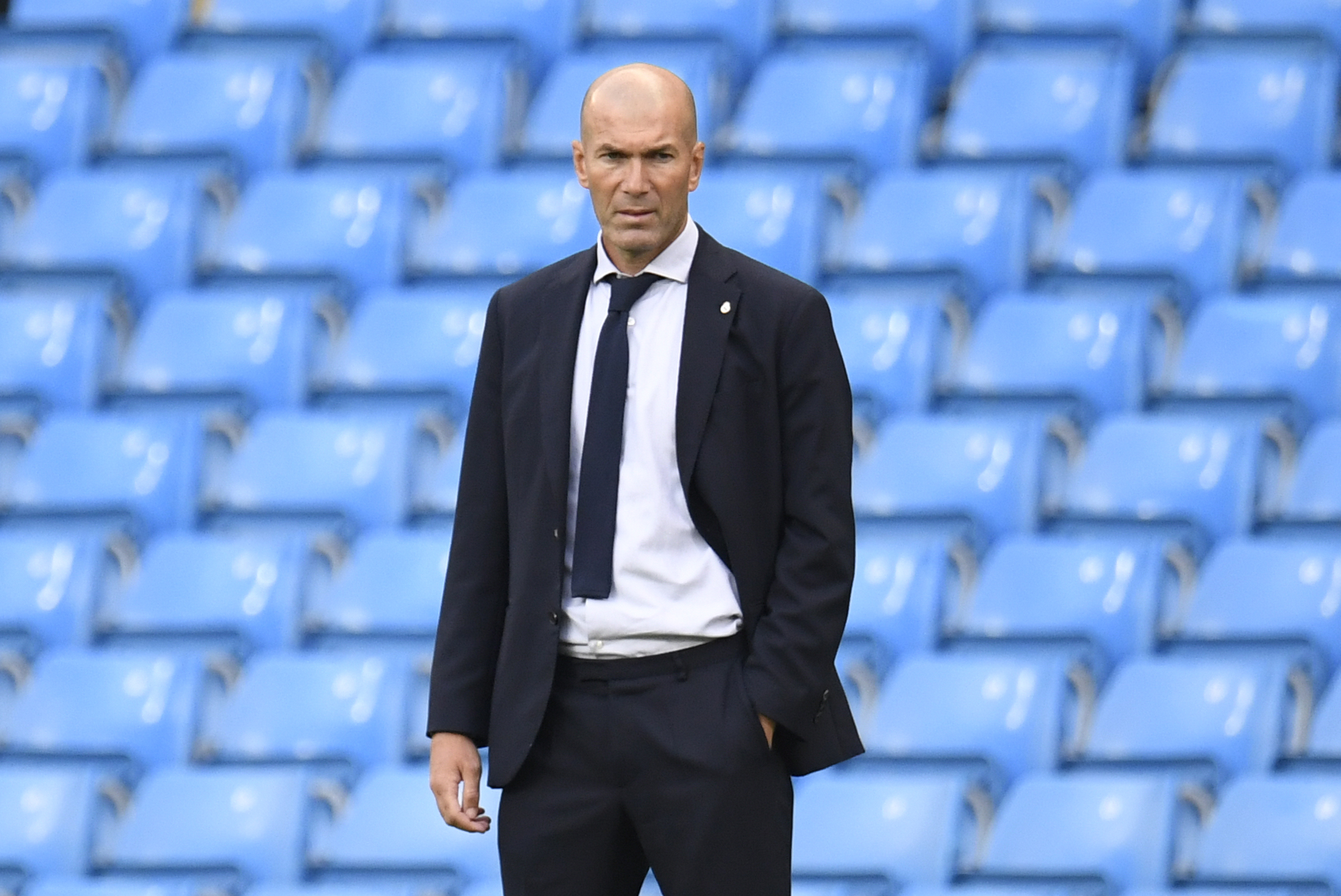 Soccer Football - Champions League - Round of 16 Second Leg - Manchester City v Real Madrid - Etihad Stadium, Manchester, Britain - August 7, 2020 Real Madrid coach Zinedine Zidane during the match, as play resumes behind closed doors following the outbreak of the coronavirus disease (COVID-19) Pool via REUTERS