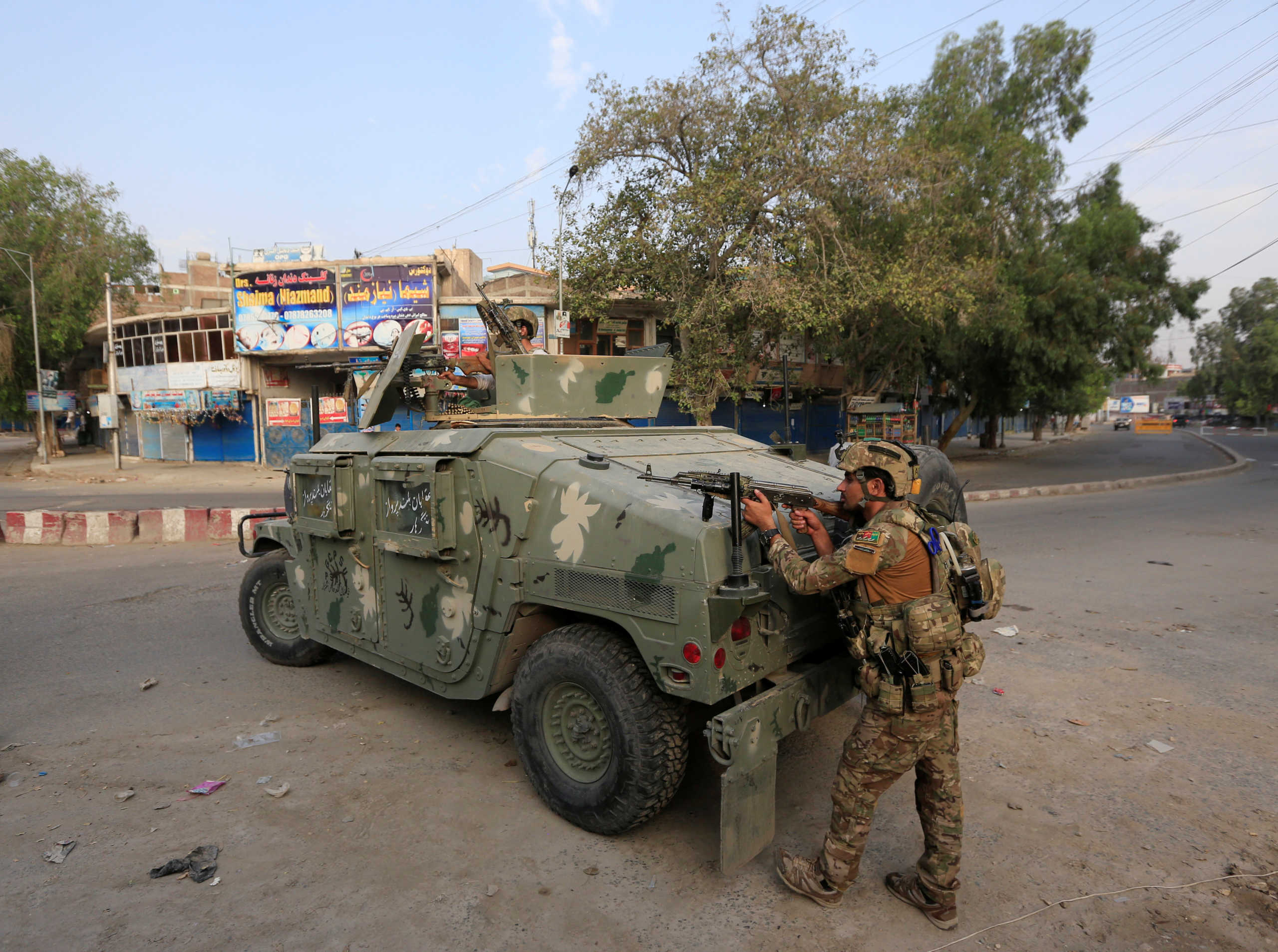 Afghan security forces keep watch near the site of an attack on a jail compound in Jalalabad, Afghanistan, August 3, 2020.REUTERS