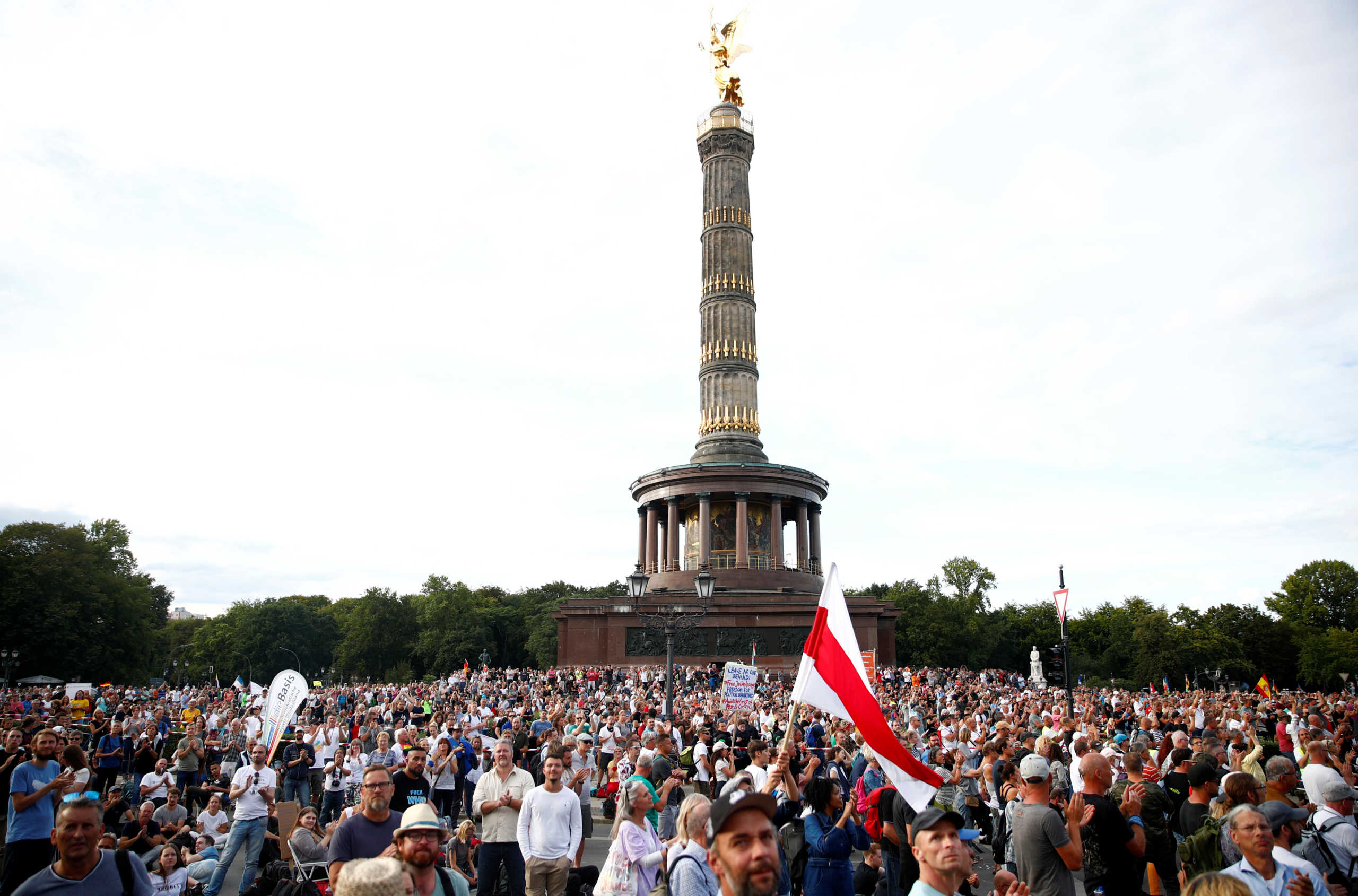 People attend a rally against the government's restrictions following the coronavirus disease (COVID-19) outbreak, in Berlin, Germany August 29, 2020. REUTERS