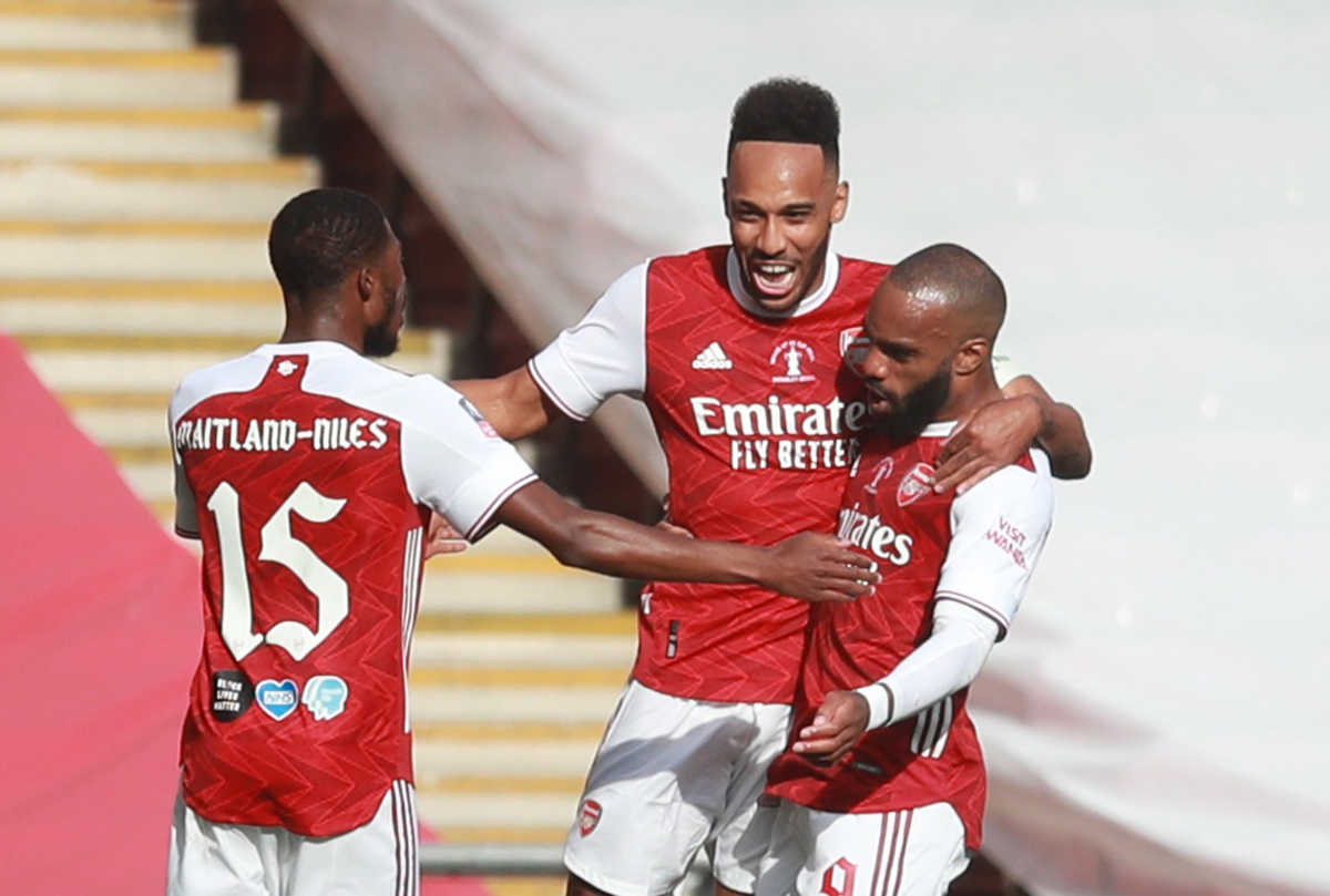 Soccer Football - FA Cup Final - Arsenal v Chelsea - Wembley Stadium, London, Britain - August 1, 2020 Arsenal's Pierre-Emerick Aubameyang celebrates scoring their first goal with teammates, as play resumes behind closed doors following the outbreak of the coronavirus disease (COVID-19) Pool via REUTERS