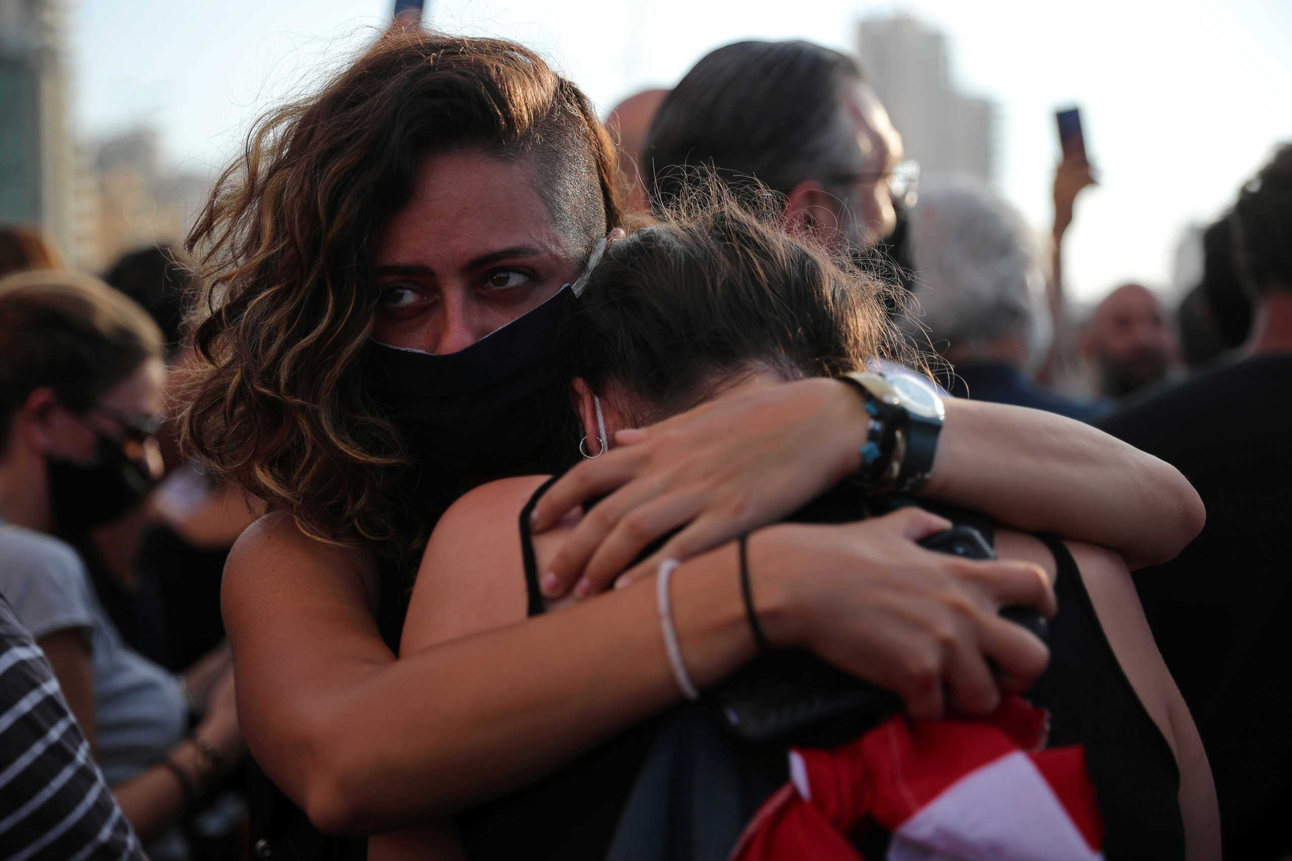 Demonstrators react during protests near the site of the blast at the Beirut's port area, Lebanon August 11, 2020. REUTERS