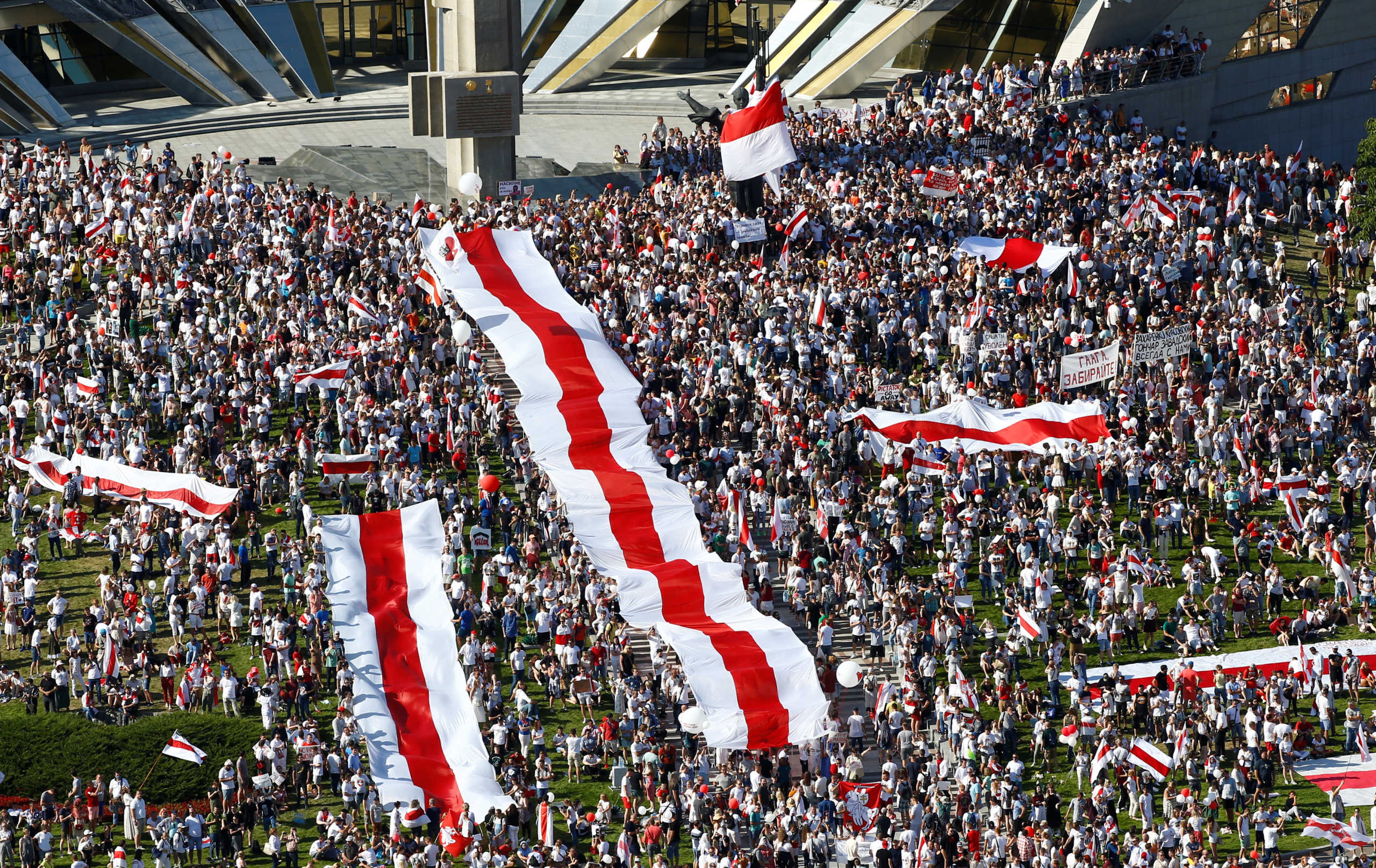 People take part in a protest against the presidential election results demanding the resignation of Belarusian President Alexander Lukashenko and the release of political prisoners, in Minsk, Belarus August 16, 2020. REUTERS
