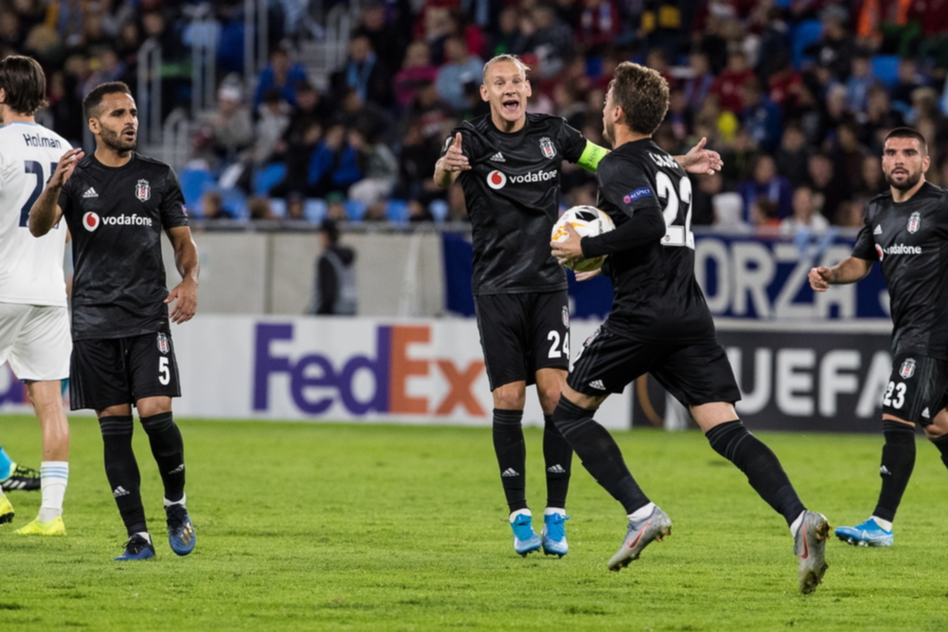 epa07854363 (L-R) Besiktas«s players Douglas, Domagoj Vida and Adem Ljajic celebrate during the UEFA Europa League group K soccer match between SK SLovan Bratislava and Besiktas JK in Bratislava, Slovakia, 19 September 2019.  EPA