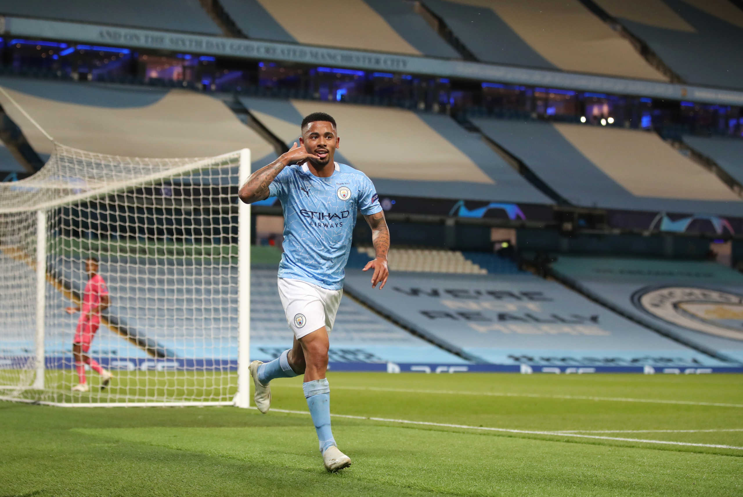 Soccer Football - Champions League - Round of 16 Second Leg - Manchester City v Real Madrid - Etihad Stadium, Manchester, Britain - August 7, 2020 Manchester City's Gabriel Jesus celebrates scoring their second goal, as play resumes behind closed doors following the outbreak of the coronavirus disease (COVID-19) Pool via REUTERS