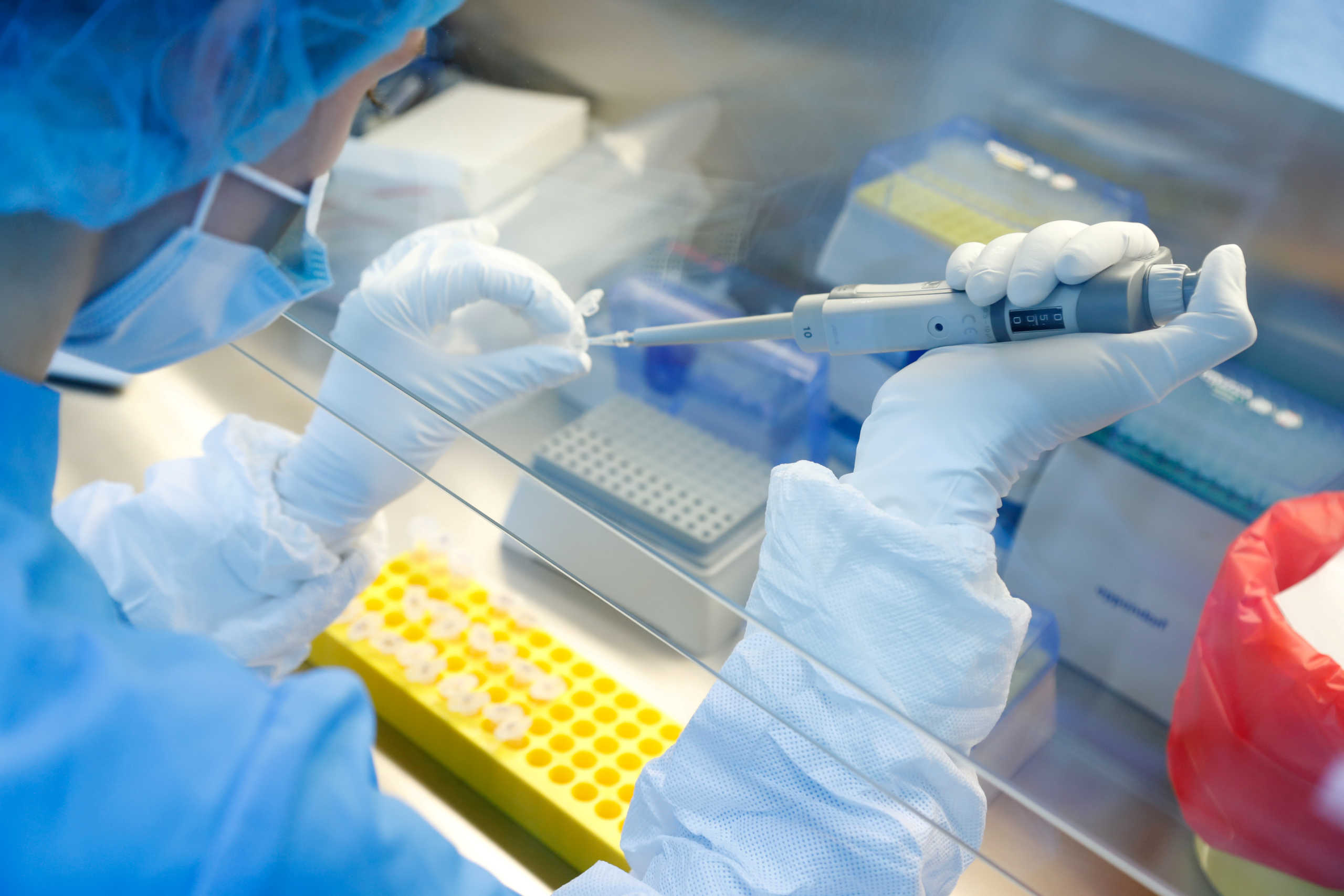 FILE PHOTO: A scientist prepares samples during the research and development of a vaccine against the coronavirus disease (COVID-19) at a laboratory of BIOCAD biotechnology company in Saint Petersburg, Russia June 11, 2020. REUTERS