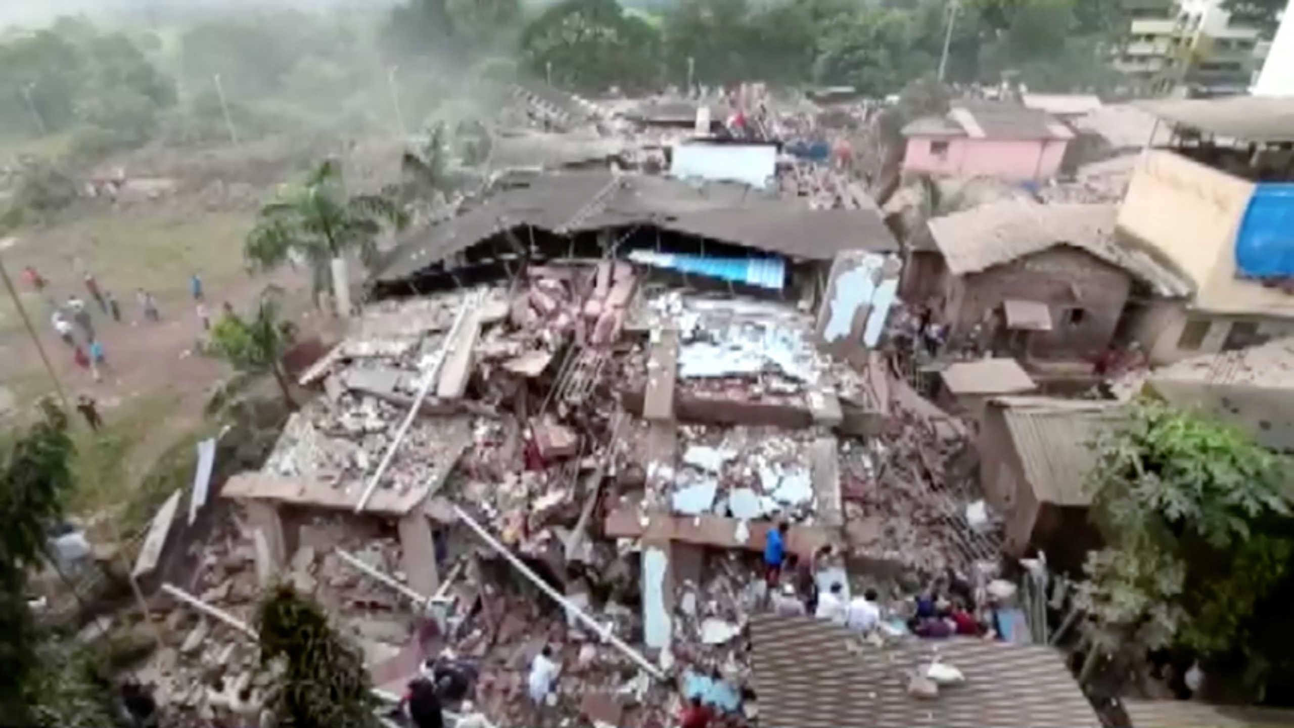 A general view shows debris of a collapsed building in Raigad in the western state of Maharashtra, India August 24, 2020 in this still image taken from video.  ANI via REUTERS TV THIS IMAGE HAS BEEN SUPPLIED BY A THIRD PARTY. INDIA OUT. NO COMMERCIAL OR EDITORIAL SALES IN INDIA  BROADCASTERS: NO USE INDIA DIGITAL: NO USE INDIA. FOR REUTERS CUSTOMERS ONLY.