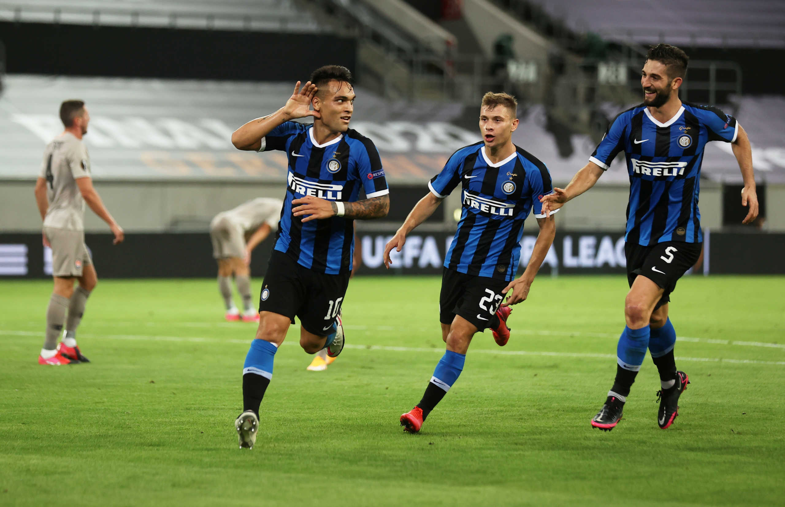 Soccer Football - Europa League - Semi Final - Inter Milan v Shakhtar Donetsk - Merkur Spiel-Arena, Dusseldorf, Germany - August 17, 2020  Inter Milan's Lautaro Martinez celebrates scoring their third goal, as play resumes behind closed doors following the outbreak of the coronavirus disease (COVID-19)  Lars Baron