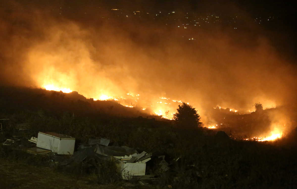 Burning fire is seen in Houla village near the Lebanese-Israeli border, in southern Lebanon, August 25, 2020. Picture taken August 25, 2020. REUTERS