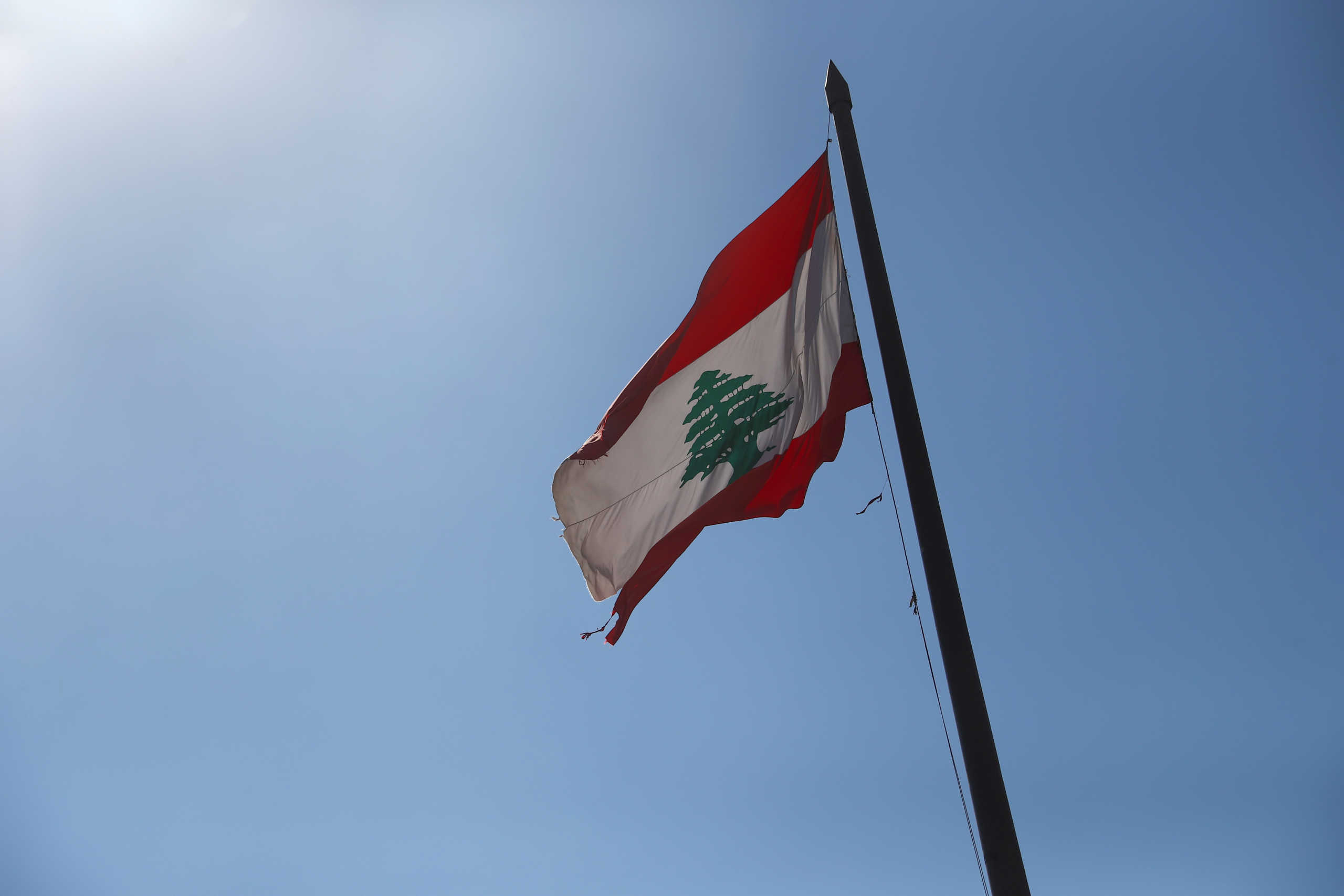 Lebanese national flag flutters in Beirut, Lebanon, August 18, 2020. REUTERS