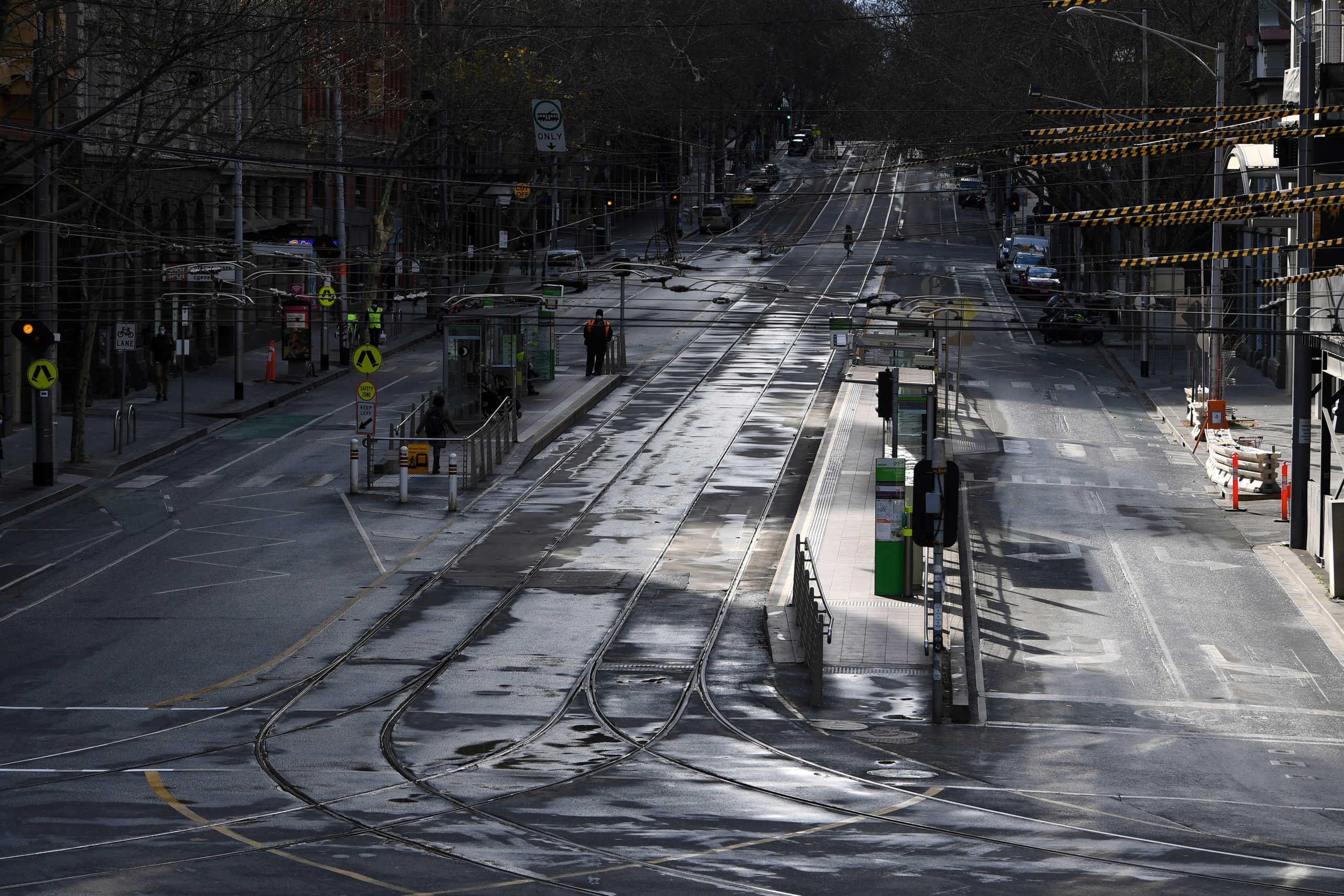 A general view along Bourke Street as the city operates under lockdown in response to an outbreak of the coronavirus disease (COVID-19) in Melbourne, Australia, August 12, 2020.  AAP Image