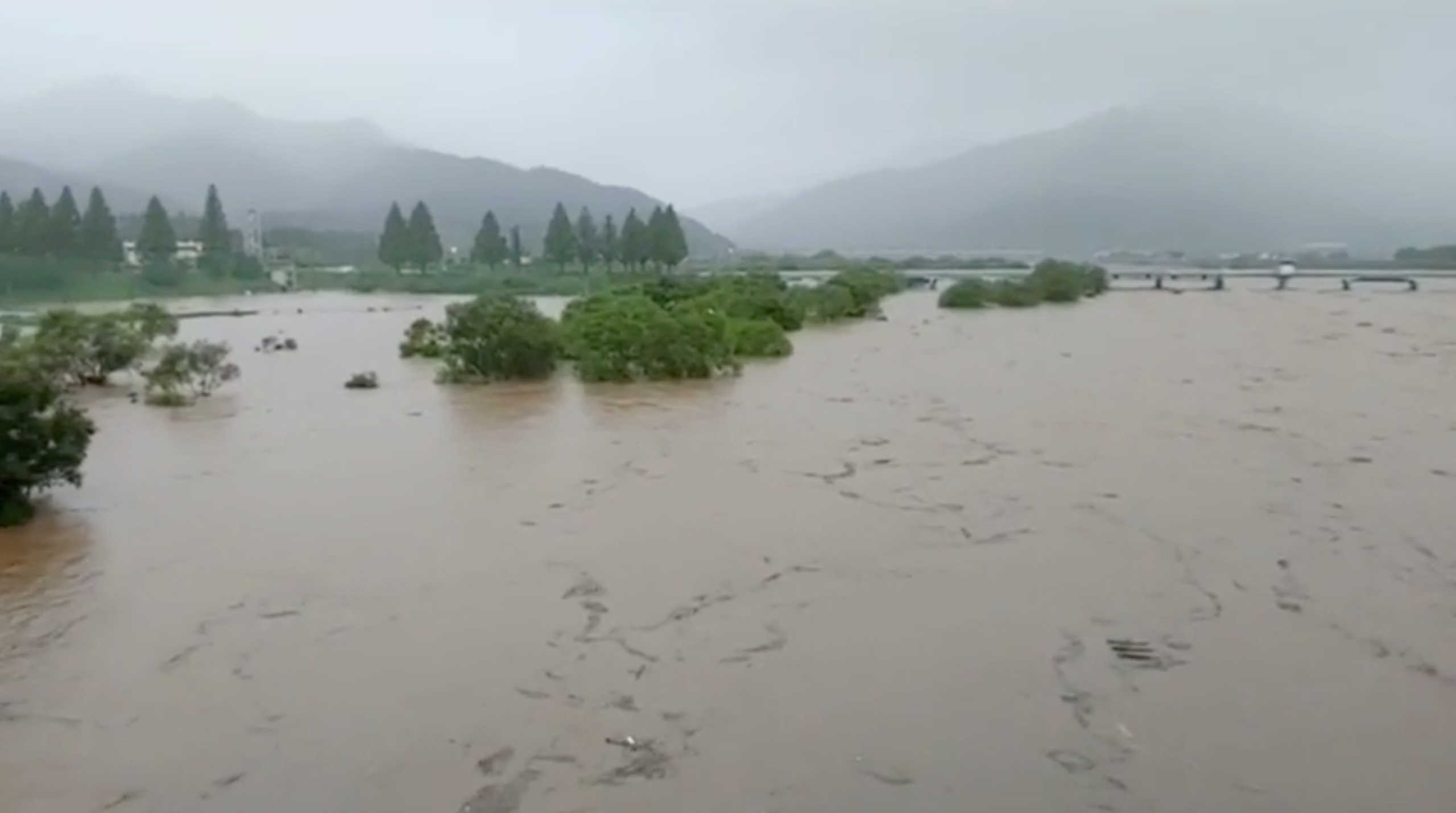 General view shows flooding along Seomjin River amid monsoon rains in Gokseong, South Korea August 7, 2020 in this still image taken August 8, 2020 from social media video. Lee Dong Hyun