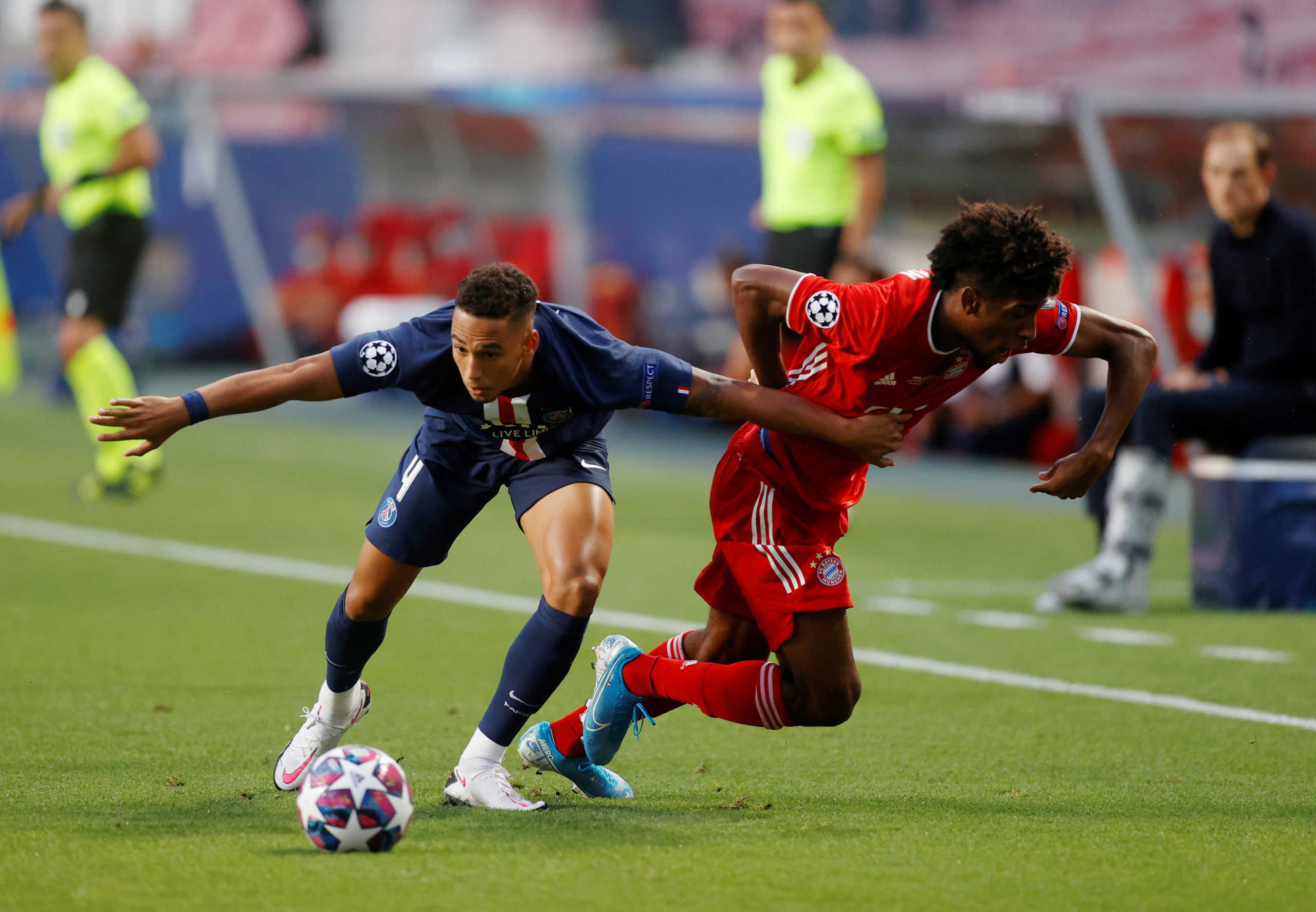 Soccer Football - Champions League - Final - Bayern Munich v Paris St Germain - Estadio da Luz, Lisbon, Portugal - August 23, 2020 Paris St Germain's Jan Kehrer in action with Bayern Munich's Kingsley Coman, as play resumes behind closed doors following the outbreak of the coronavirus disease (COVID-19)  REUTERS