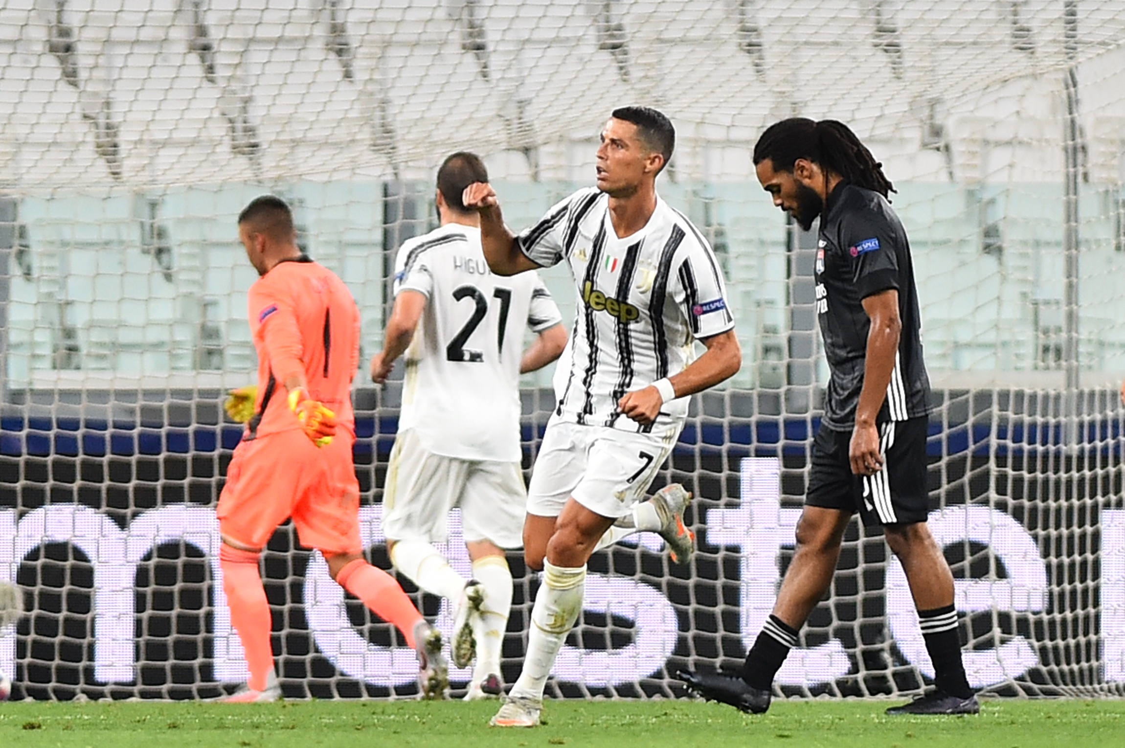 Soccer Football - Champions League - Round of 16 Second Leg - Juventus v Olympique Lyonnais - Allianz Stadium, Turin, Italy - August 7, 2020   Juventus' Cristiano Ronaldo celebrates scoring their second goal, as play resumes behind closed doors following the outbreak of the coronavirus disease (COVID-19) REUTERS