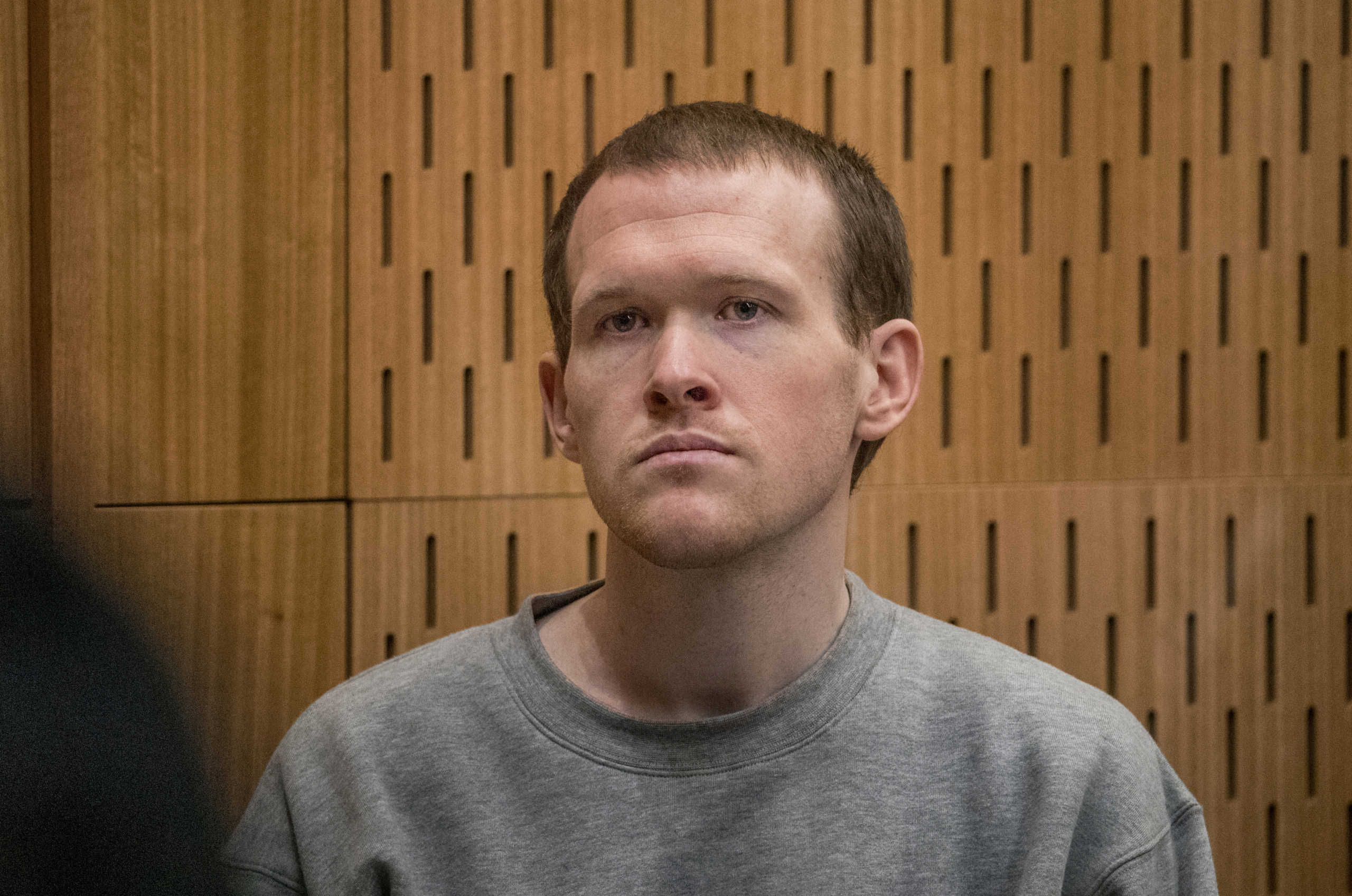 Brenton Tarrant, the gunman who shot and killed worshippers in the Christchurch mosque attacks, listens as Crown prosecutor Mark Zarifeh delivers his submission during Tarrant's sentencing at the High Court in Christchurch, New Zealand, August 27, 2020.  John Kirk-Anderson