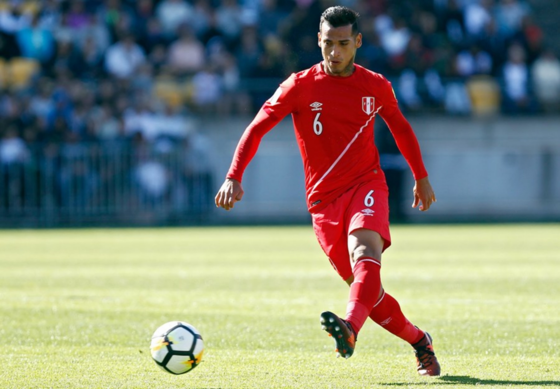 epa06321731 Peru's Miguel Trauco kicks the ball in the 2018 FIFA World Cup Russia qualifying play-off match between New Zealand and Peru at Westpac Stadium, in Wellington, New Zealand, 11 November 2017.  EPA