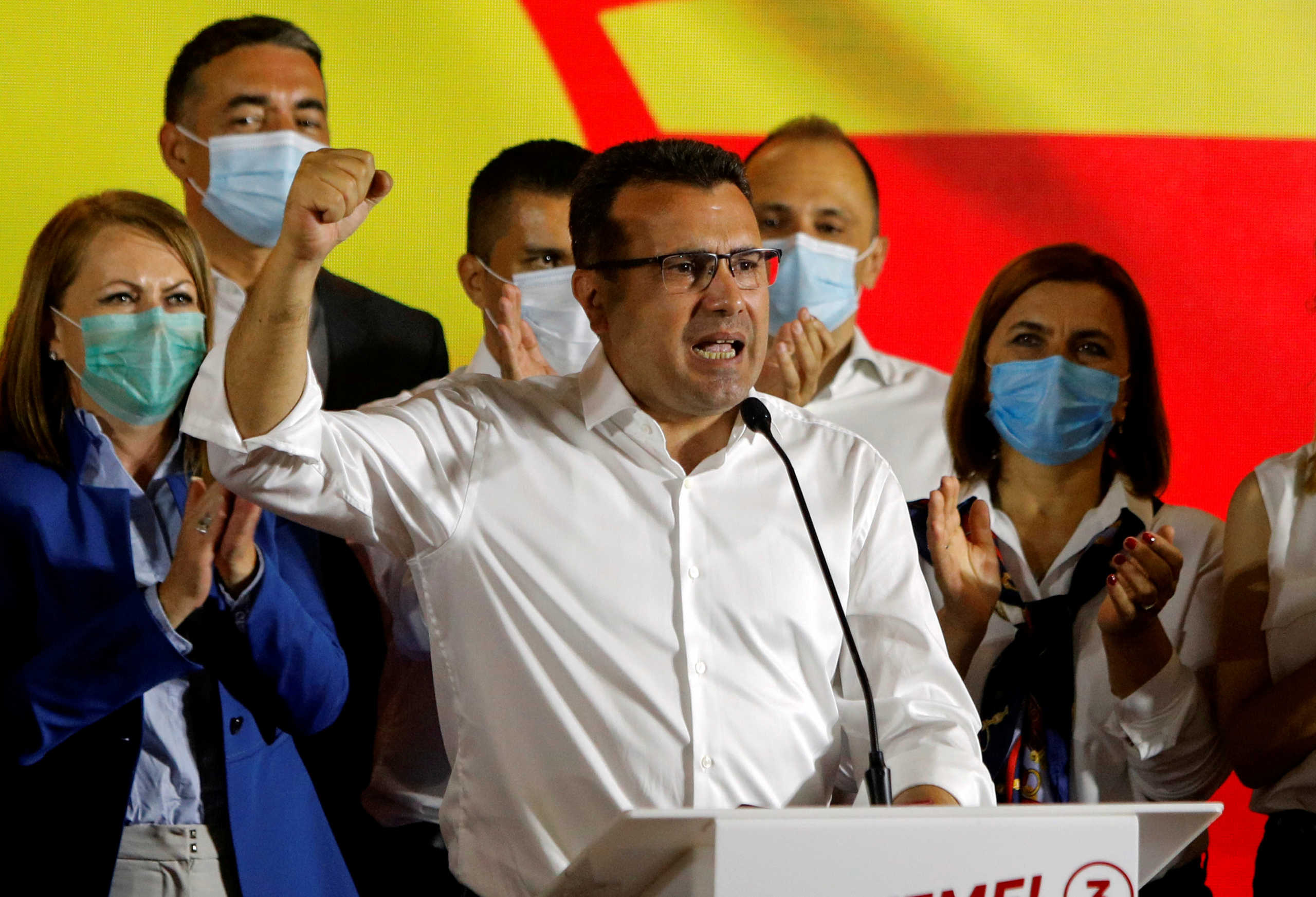 FILE PHOTO: North Macedonian ex-prime minister Zoran Zaev celebrates his party bloc's narrow victory in a parliamentary election in Skopje, North Macedonia, July 16, 2020. REUTERS