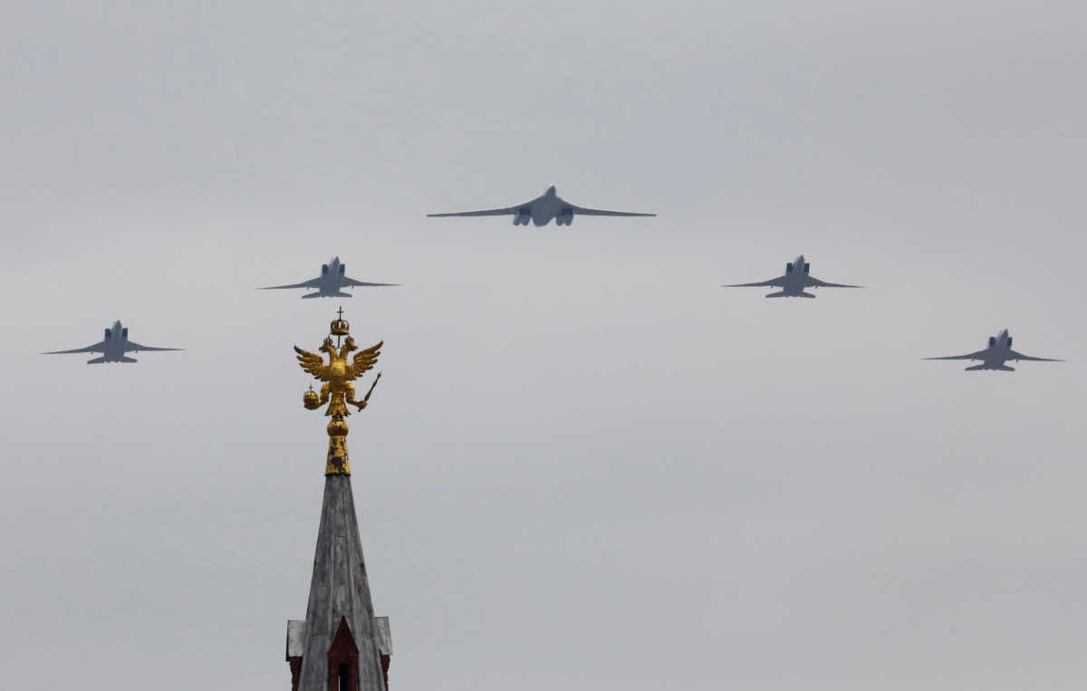 A Tupolev Tu-160 and Tu-22M3 military aircrafts fly in formation during a rehearsal for the flypast, which marks the 75th anniversary of the victory over Nazi Germany in World War Two, in Moscow, Russia May 4, 2020. The traditional large-scale Victory Day military parade across Red Square was postponed due to the outbreak of the coronavirus disease (COVID 19). REUTERS