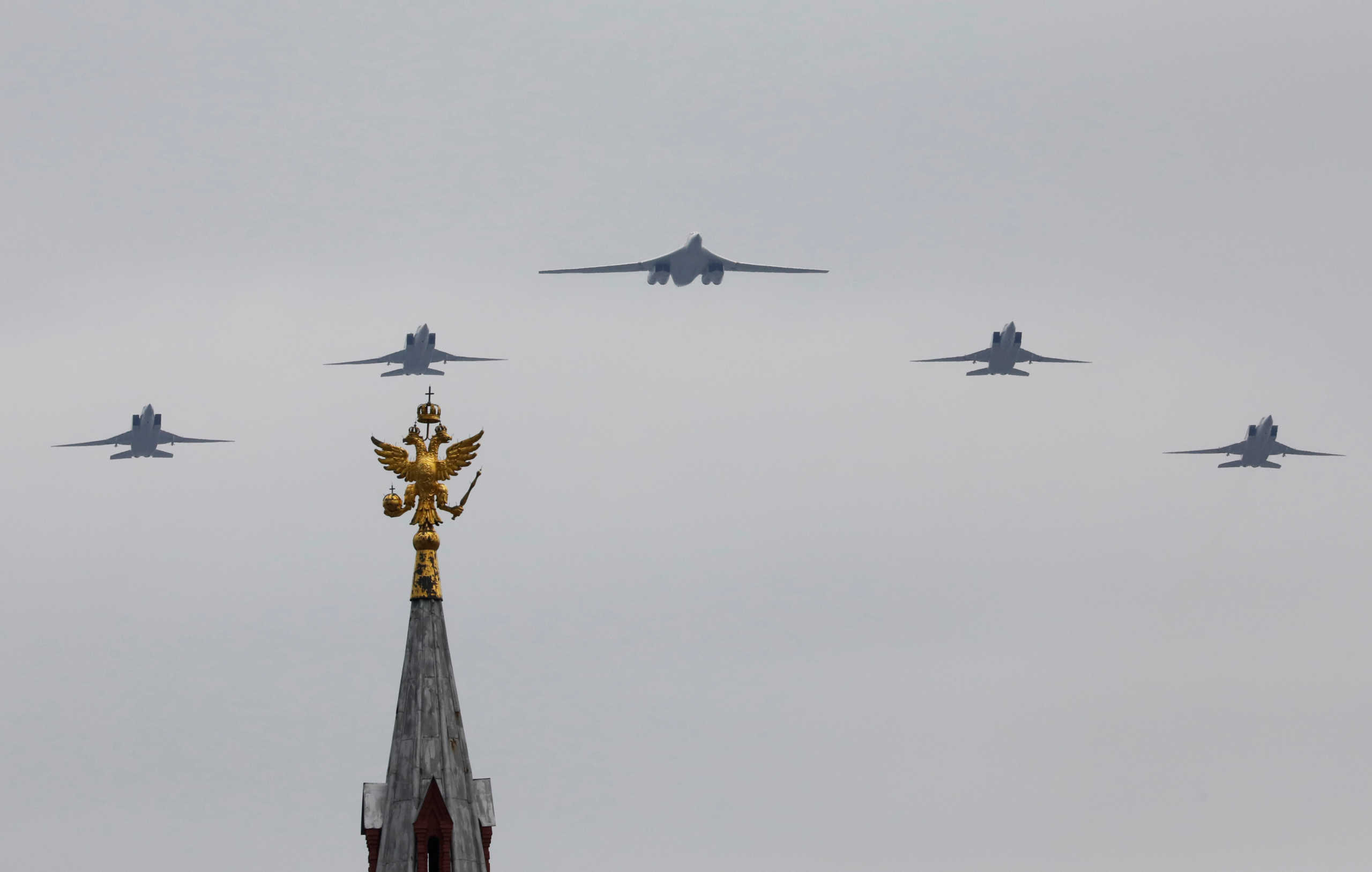 A Tupolev Tu-160 and Tu-22M3 military aircrafts fly in formation during a rehearsal for the flypast, which marks the 75th anniversary of the victory over Nazi Germany in World War Two, in Moscow, Russia May 4, 2020. The traditional large-scale Victory Day military parade across Red Square was postponed due to the outbreak of the coronavirus disease (COVID 19). REUTERS