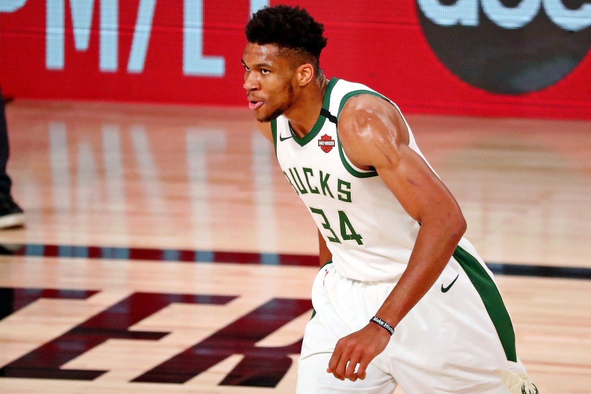Sep 6, 2020; Lake Buena Vista, Florida, USA; Milwaukee Bucks forward Giannis Antetokounmpo (34) reacts after a play against the Miami Heat  during the first half of game four of the second round of the 2020 NBA Playoffs at ESPN Wide World of Sports Complex. Mandatory Credit: Kim Klement-USA TODAY Sports